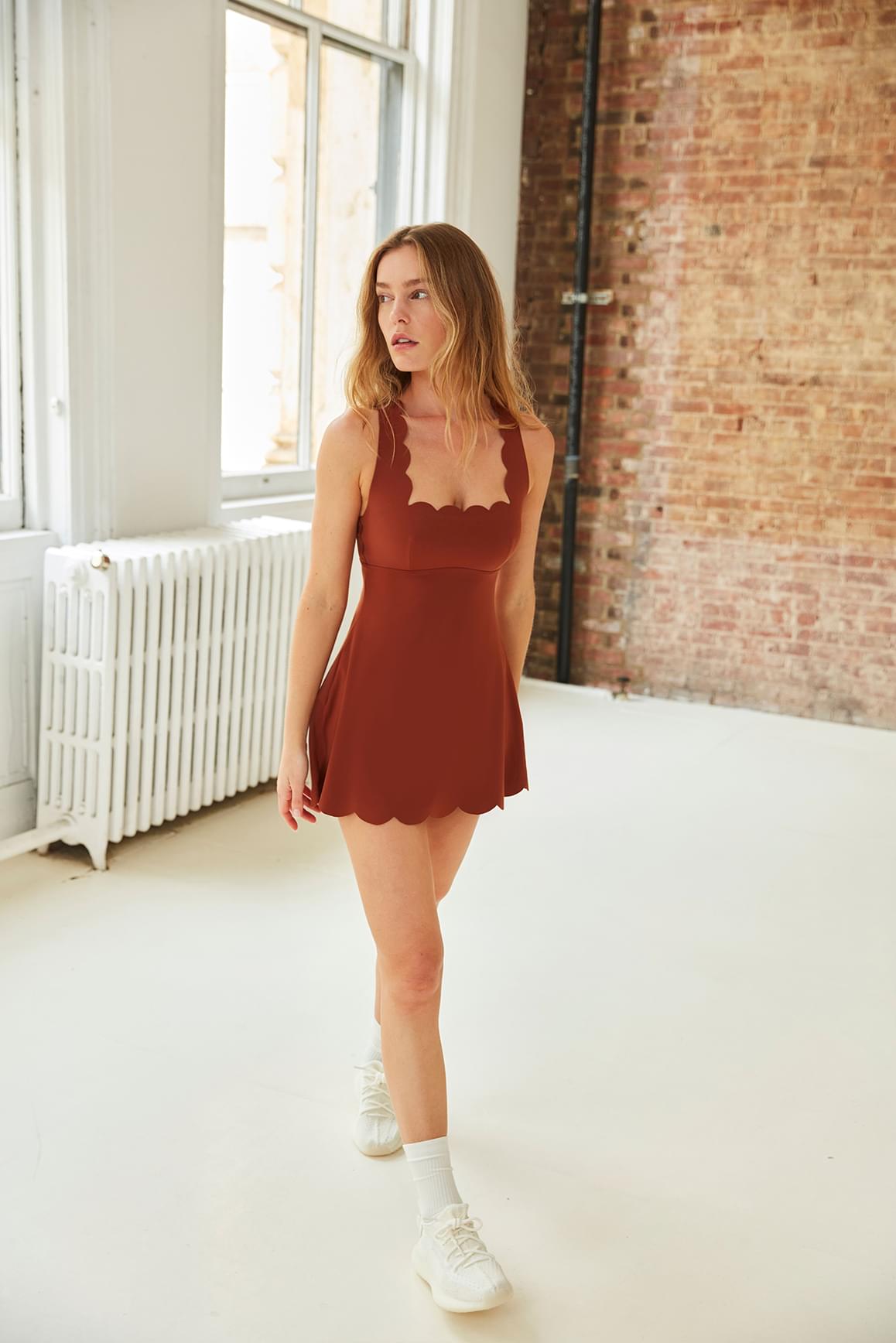 WISKII cross back tennis dress featuring a fitted silhouette, breathable fabric, and stylish cross-back design for active wear.