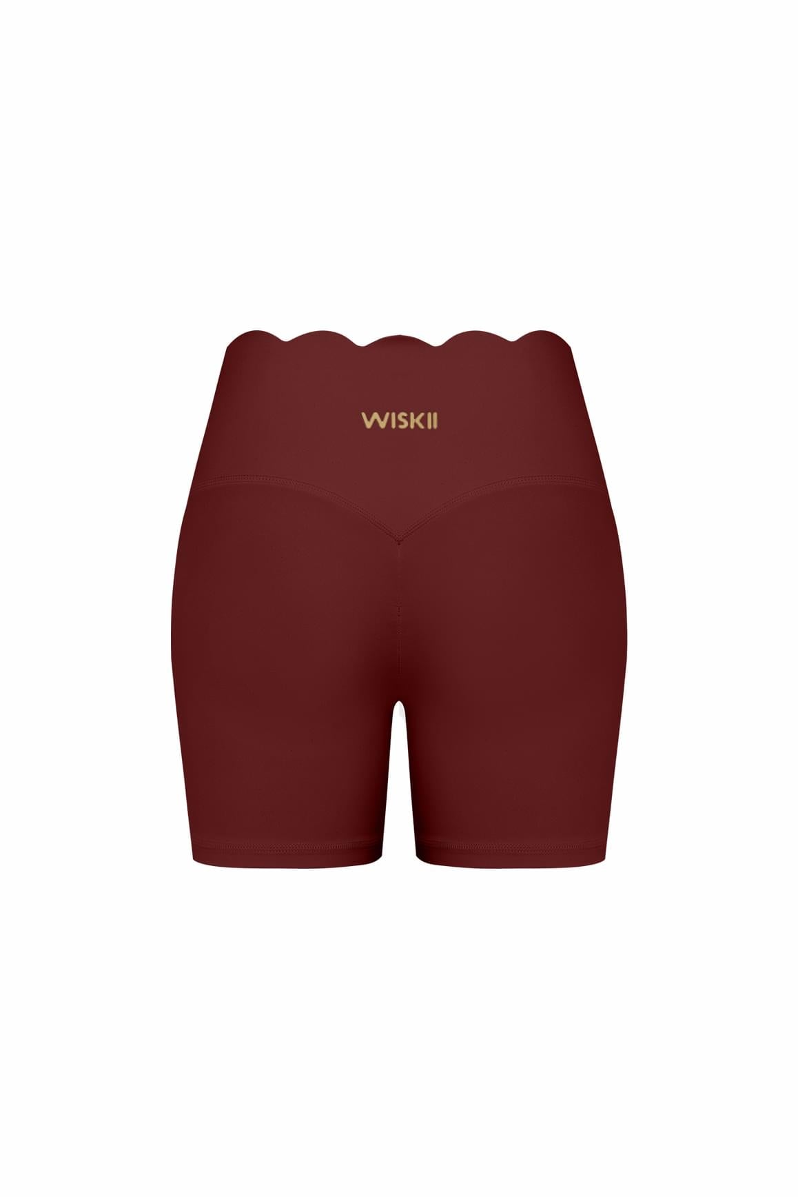 WISKII high-waist scallop scrunch shorts featuring a fitted design with scalloped hem and scrunch detail in lightweight fabric