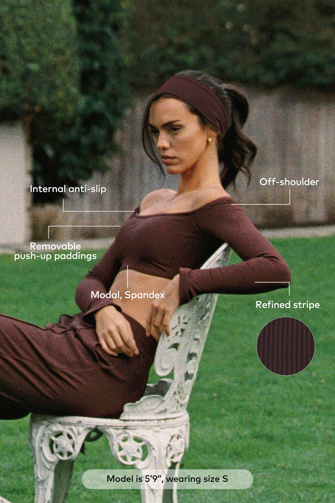 WISKII Verve off-shoulder crop top in black, featured on a model, showcasing its stylish neckline and fitted design.