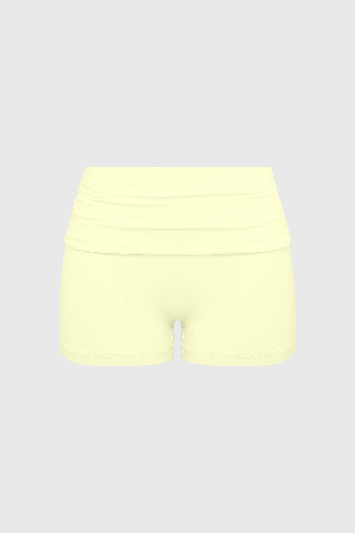 WISKII Riviera low rise scrunch shorts in vibrant fabric, featuring a fitted waistband and stylish design.