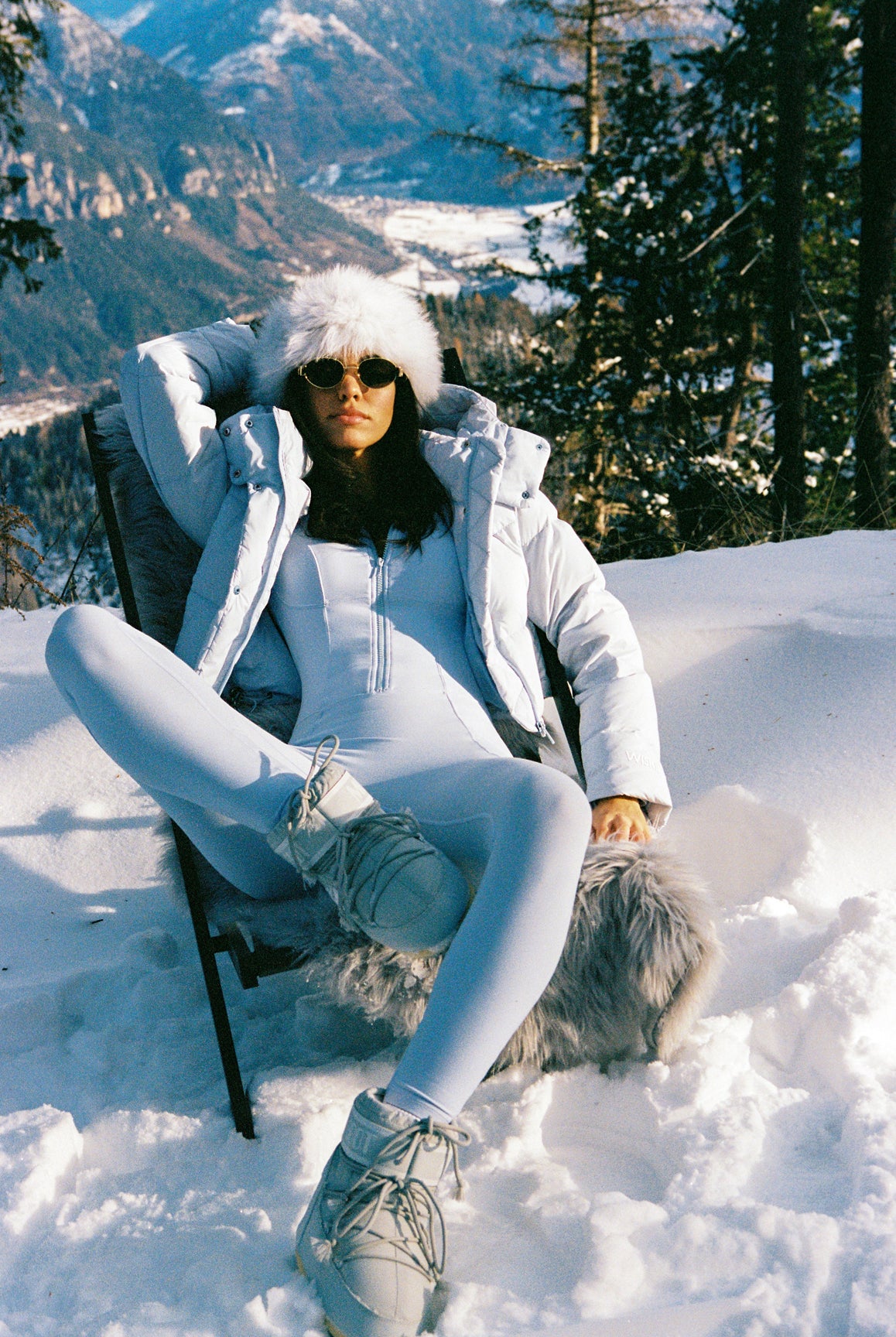 Model wears WISKII Goose Down Water-Repellent Jacket | WISKII Active | Heavenly Blue