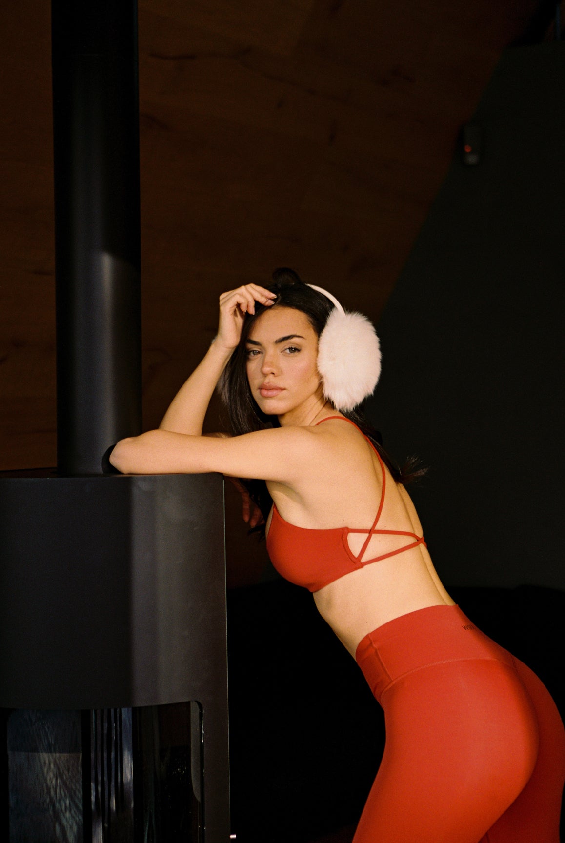 Model wears Minimal Crossback Bra | WISKII ACTIVE | Color Fire Cracker