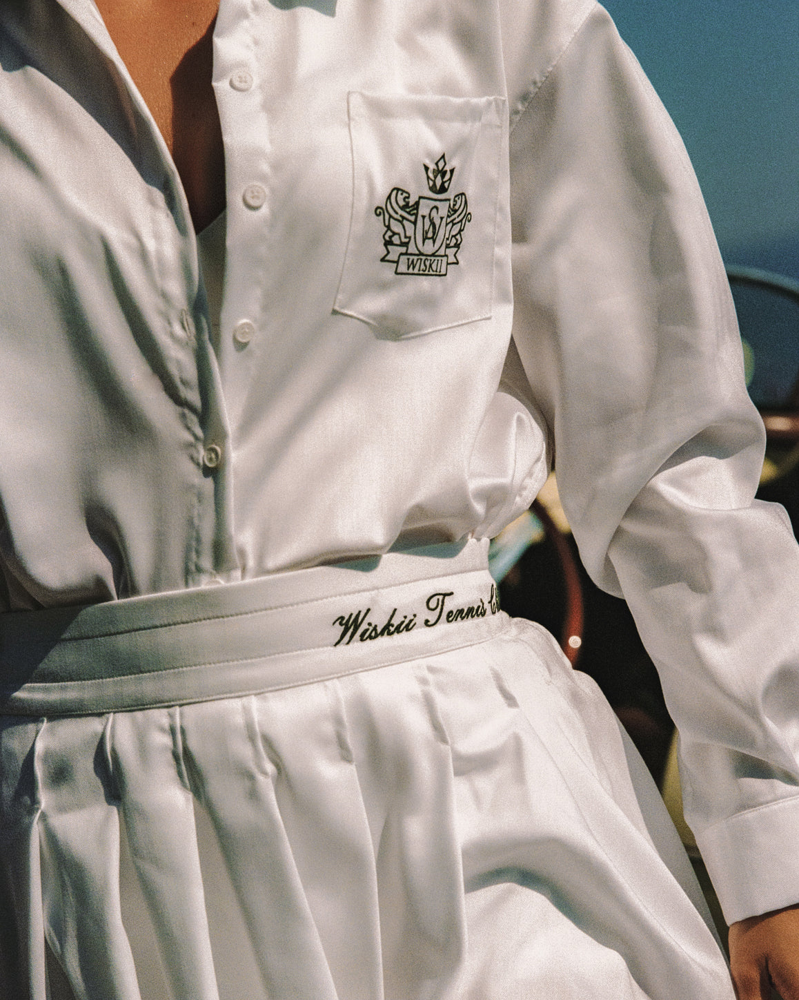 WISKII Riviera pleated skirt showcasing elegant pleats and a stylish design in a soft fabric.