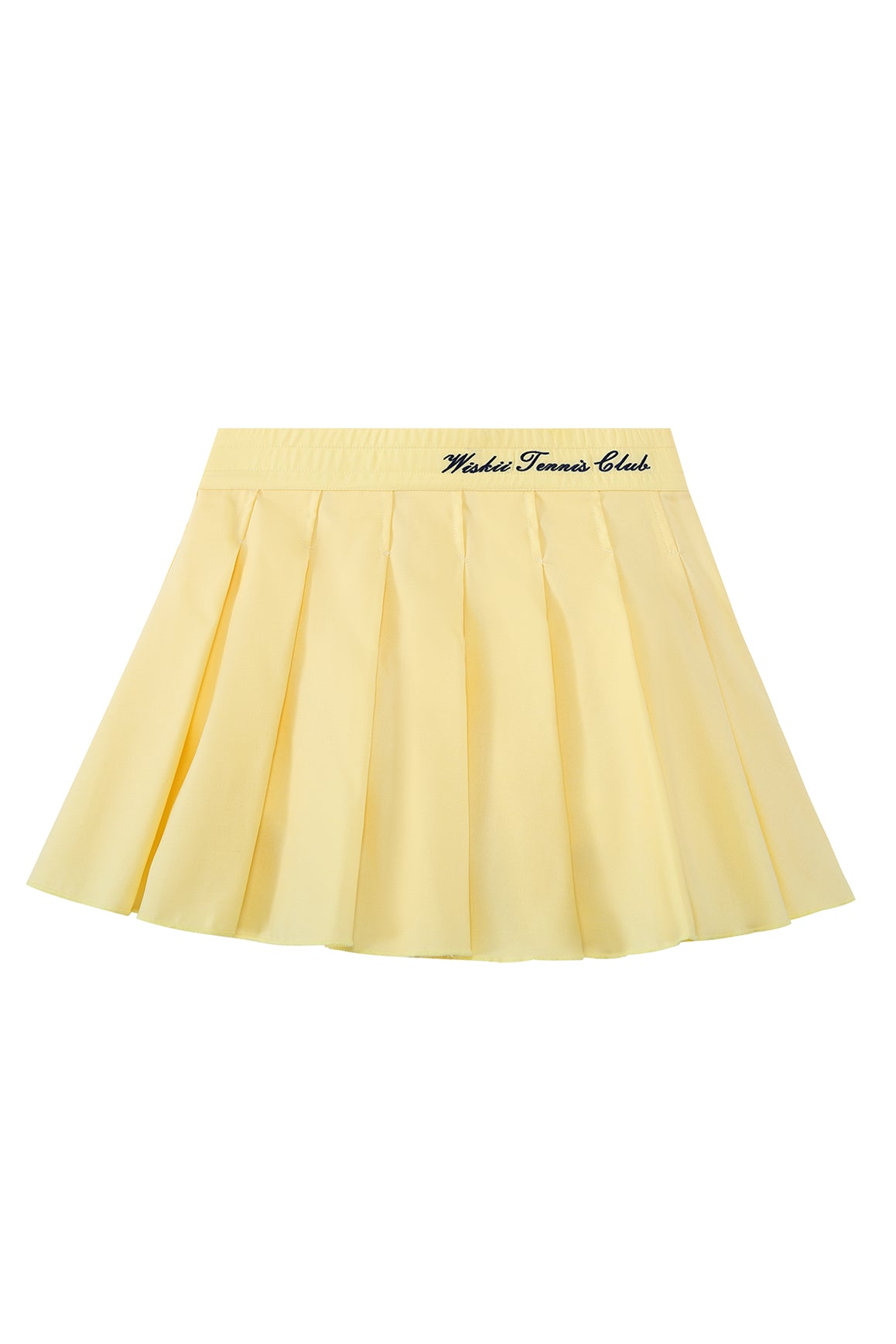 WISKII Riviera pleated skirt in a flowing design, showcasing soft fabric and elegant pleats in a stylish setting.