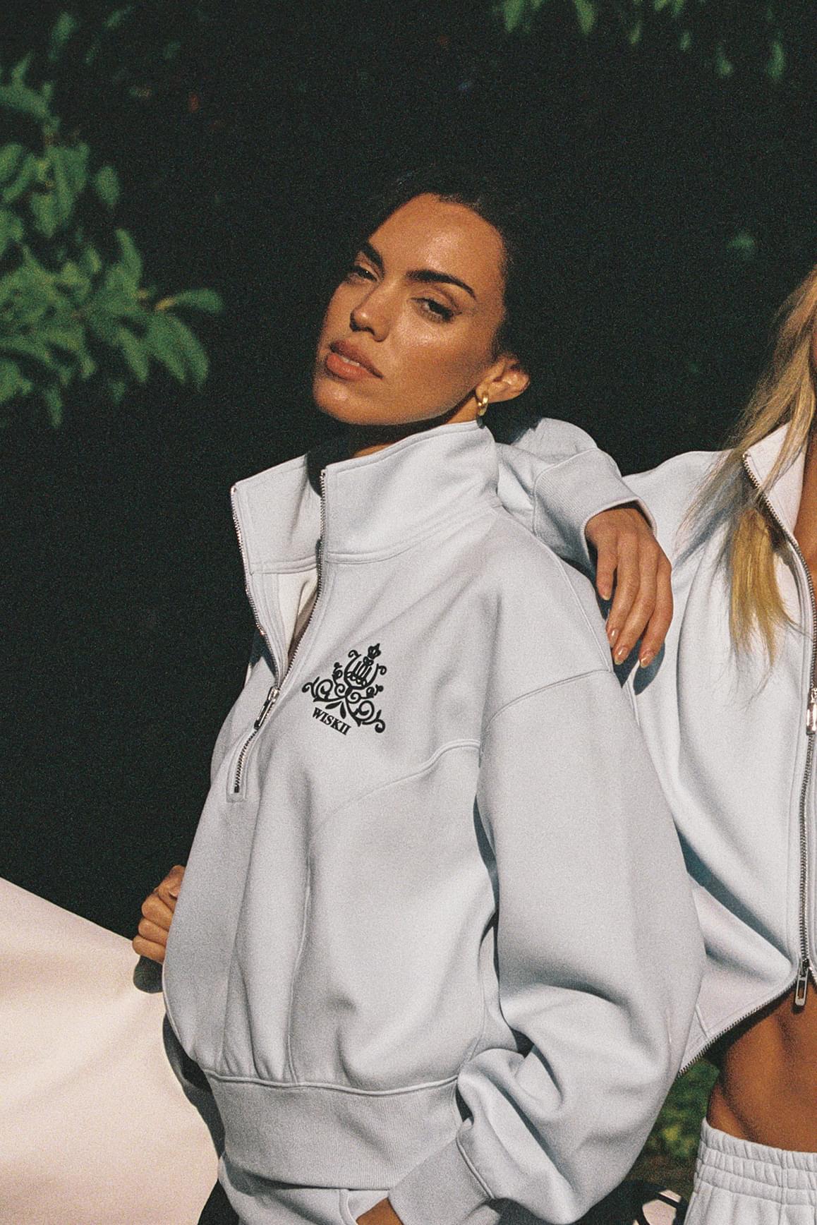 WISKII Leisure Half-zip Sweatshirt in soft loungewear style, featuring a half-zip collar and comfortable fit, shown in a neutral color.