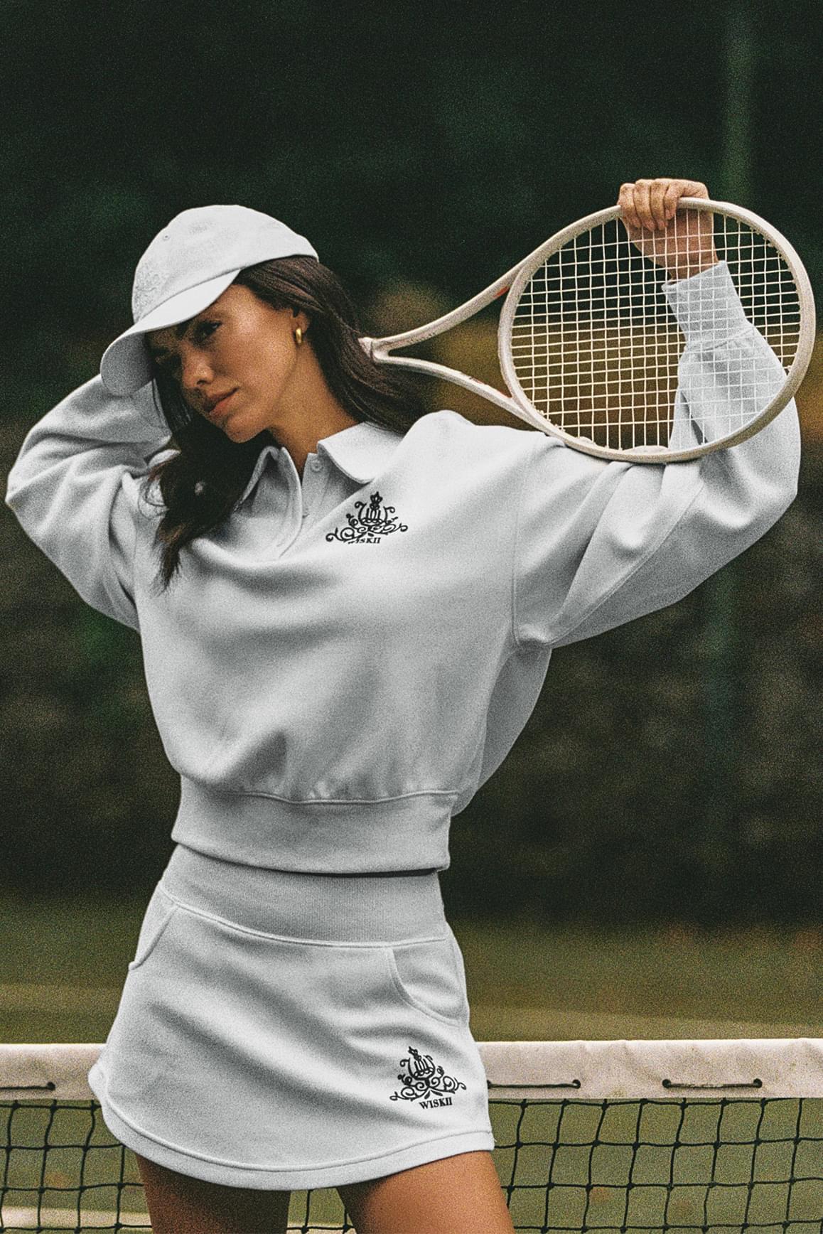WISKII Stylish Ease Mini Sweat Skirt in soft fabric, featuring a relaxed fit and casual design, perfect for everyday wear.