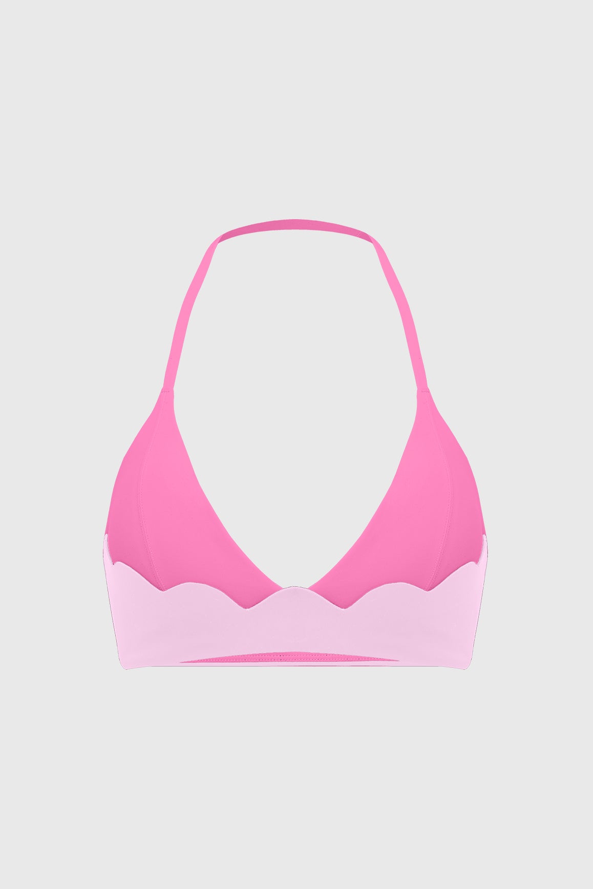 WISKII Riviera scallop contrast halter sports bra in black with scalloped edging and supportive design, shown on a mannequin.
