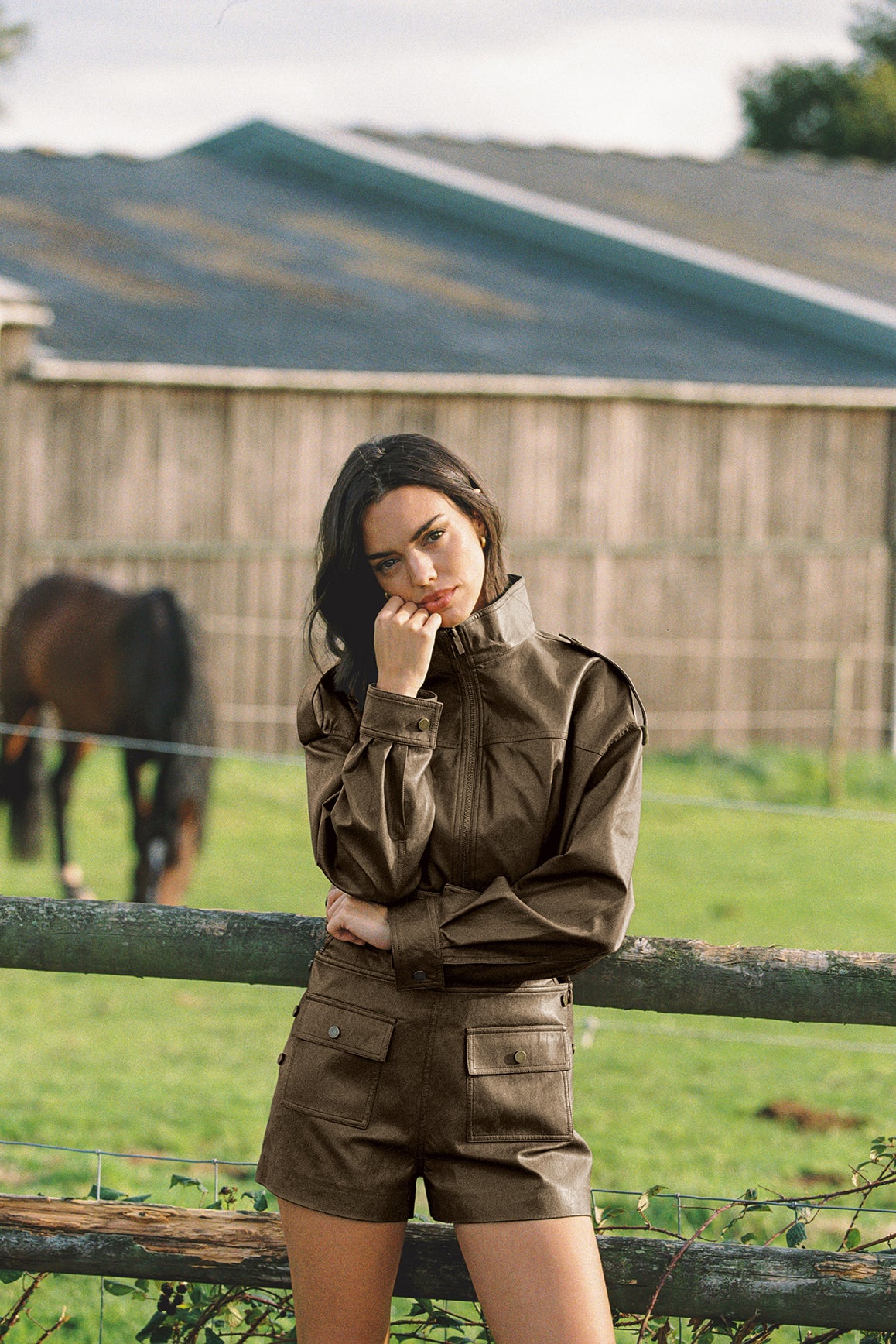 WISKII retro faux leather jacket featuring a stylish design with a hood, perfect for casual outfits.