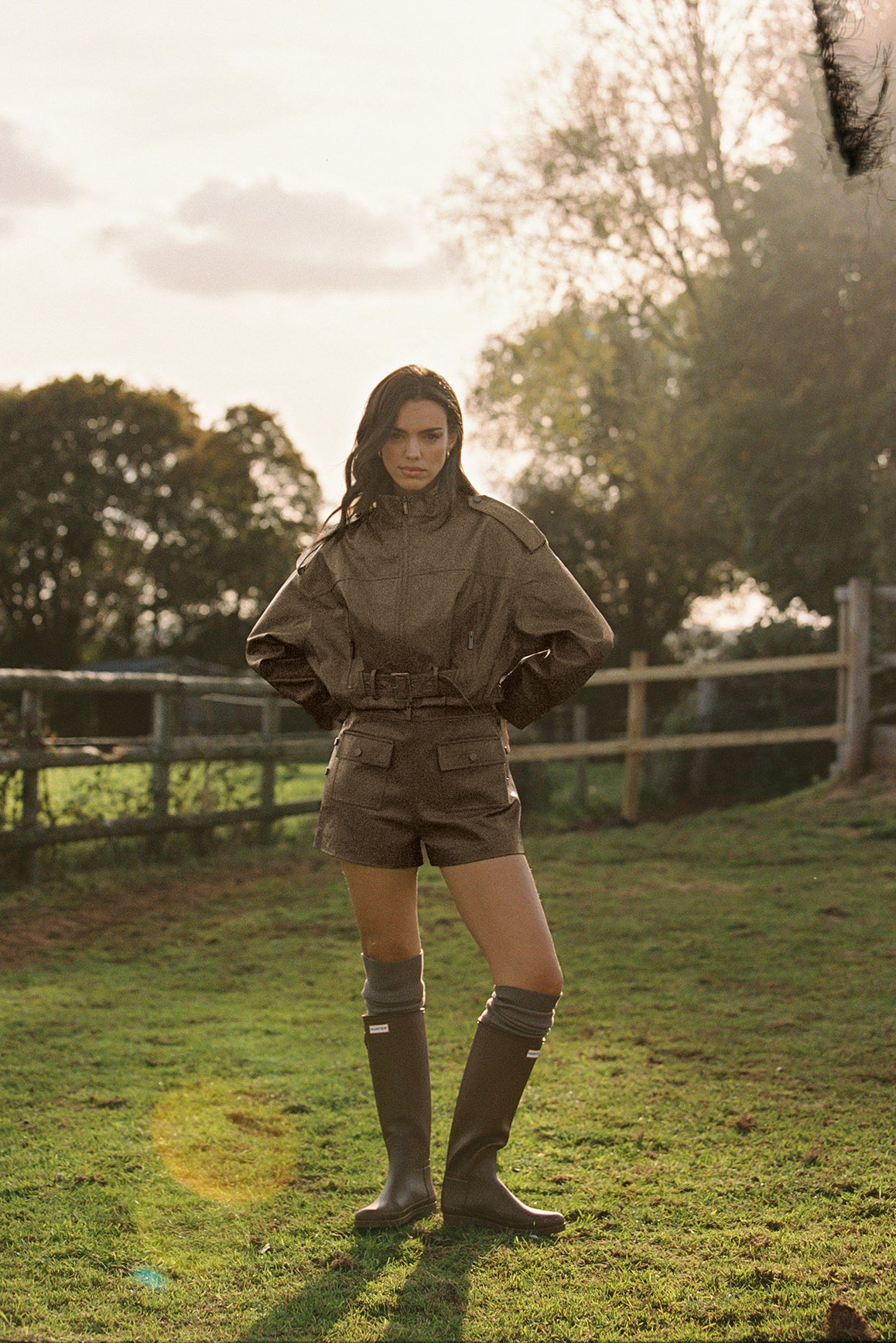 Retro faux leather jacket by WISKII featuring a stylish design and hood, perfect for a trendy outfit.