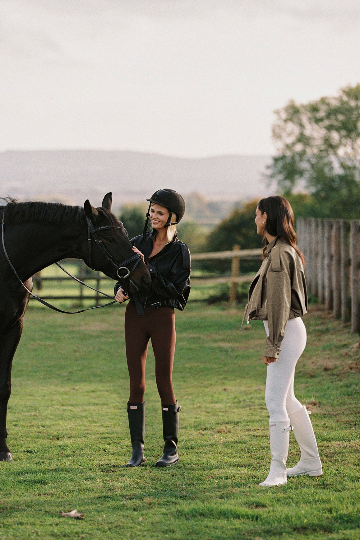 WISKII retro faux leather jacket with hood, featuring a stylish design and textured finish in a classic black color.