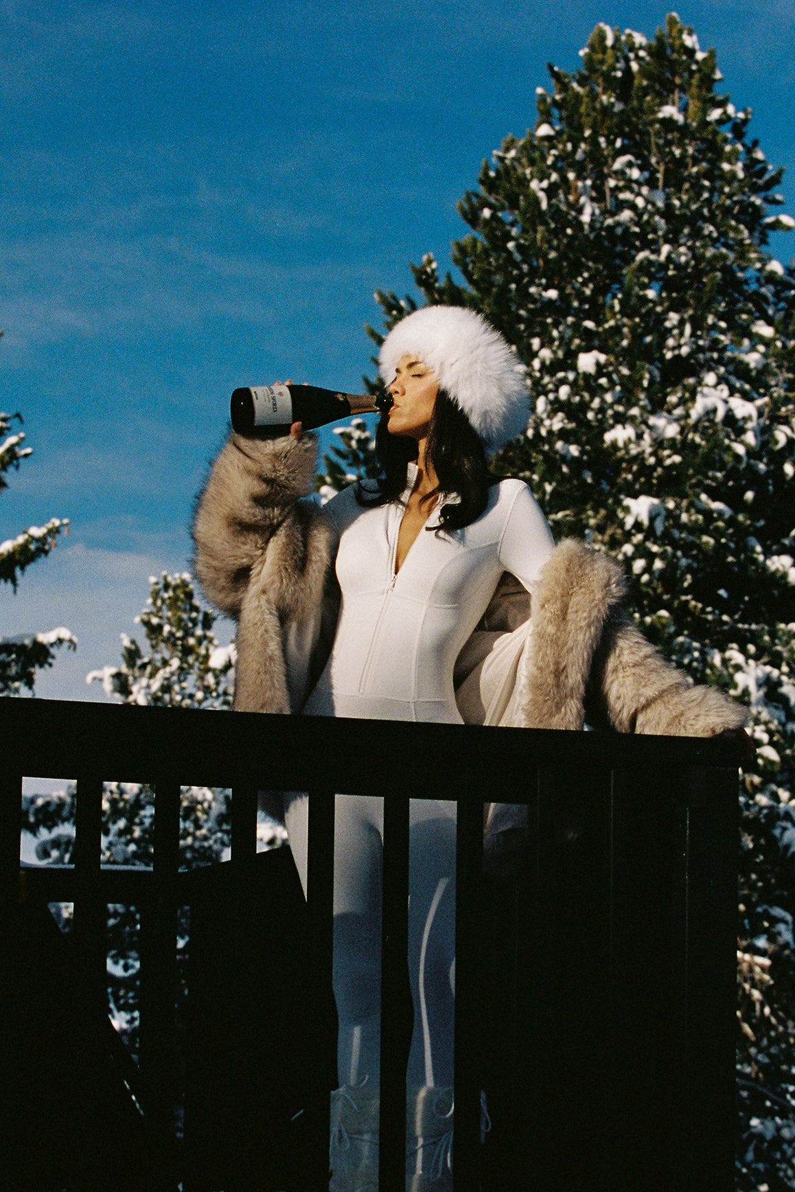 Ivory long sleeve half-zip full length unitard by WISKII, featuring a fitted design and sleek silhouette.