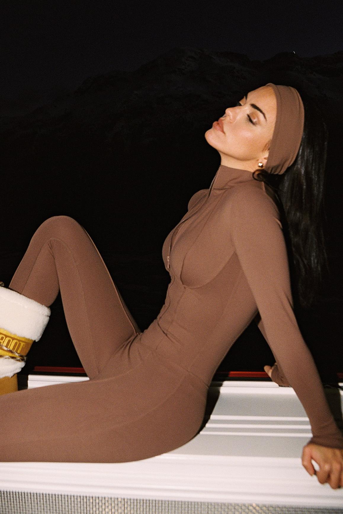 WISKII Solace Tailored Zip Catsuit in mulled wine, stylish jumpsuit with a front zipper and tailored fit, perfect for modern fashion.