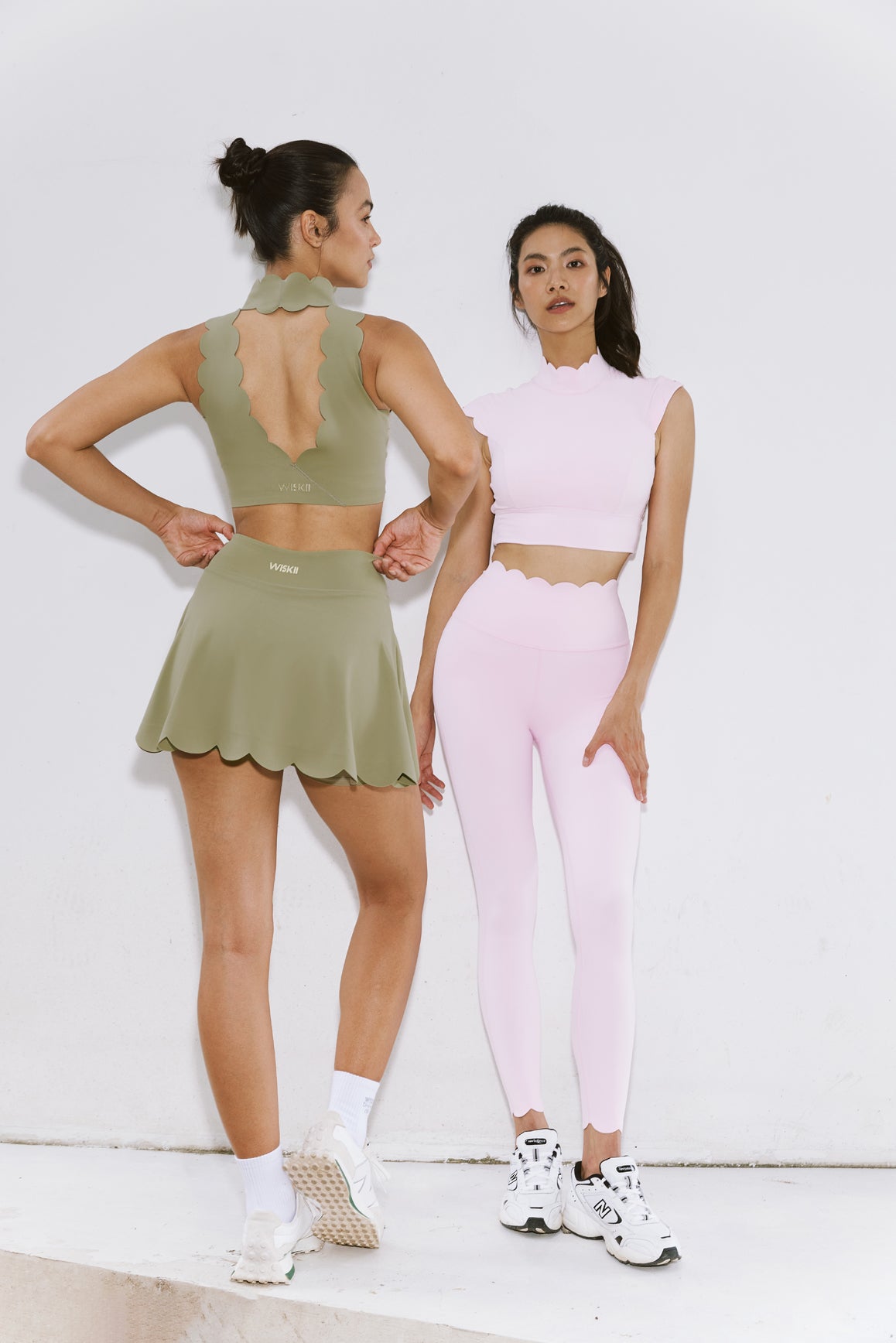 Ivory 7/8 high-waist energy leggings by WISKII, shown on a model, highlighting the comfortable fit and sleek design.