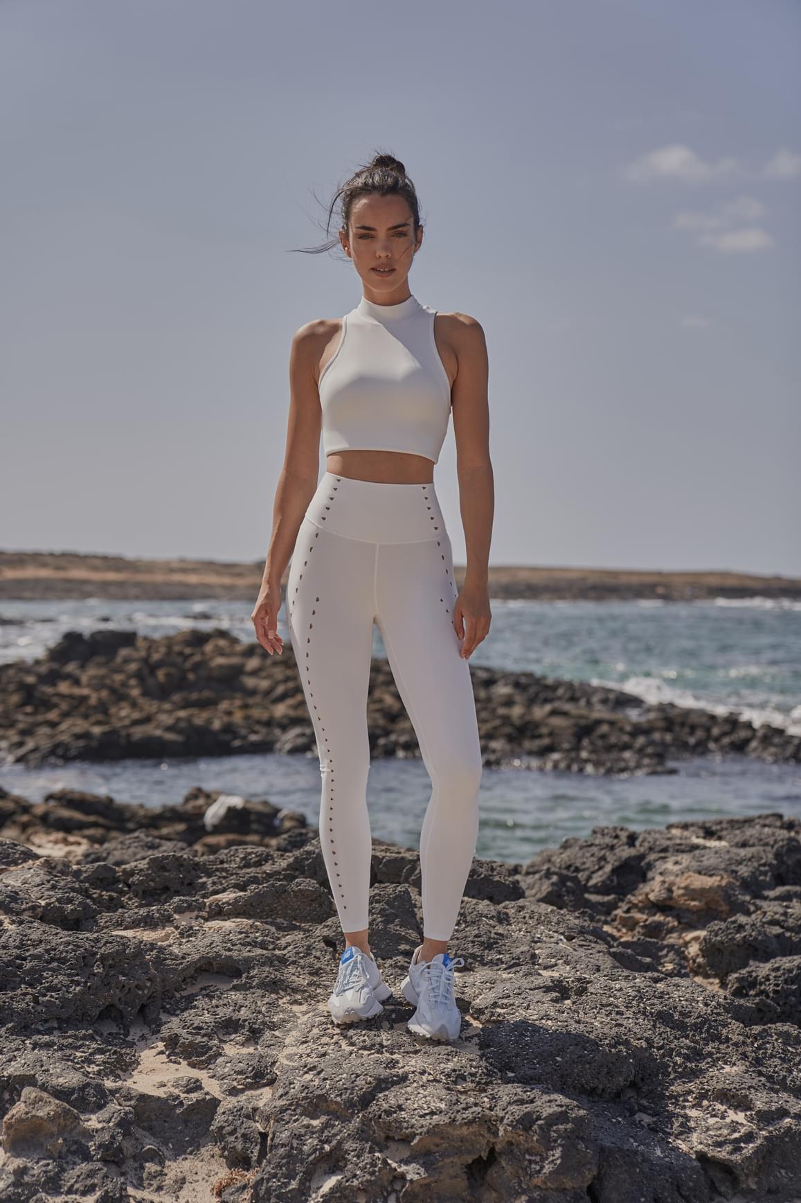 Ivory WISKII training laser cut leggings featuring stylish laser cut details and a snug fit for active wear.