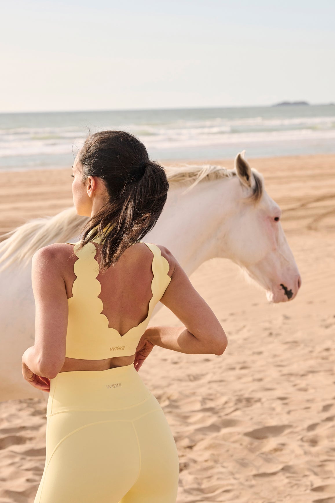 WISKII ivory V-waist yoga leggings featuring a snug fit and stretchy fabric, ideal for active wear and yoga practice.