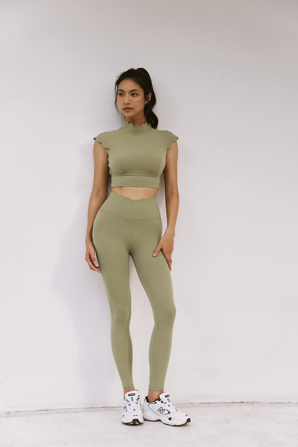 Ivory V-waist yoga leggings by WISKII, featuring a comfortable fit and stretch fabric, ideal for active workouts and casual wear.