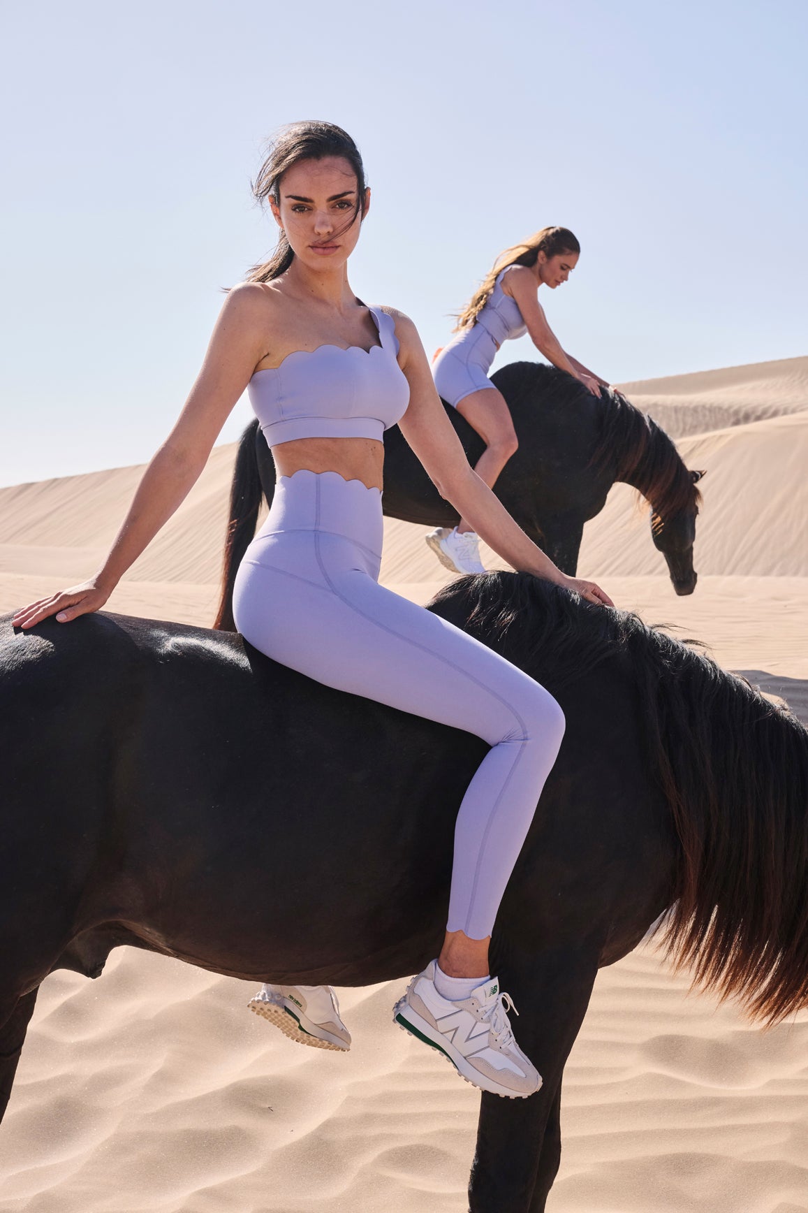 Lavender frost WISKII 7/8 high-waist energy leggings shown on a model, highlighting the fitted athletic design and comfortable stretch.