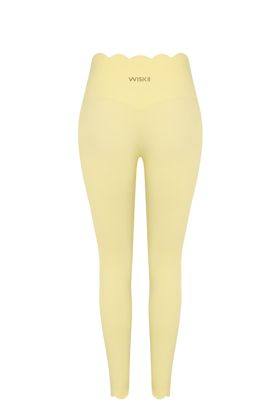 WISKII high-waist scallop scrunch leggings in sakura zen with scalloped edges and a flattering fit, shown on a model.