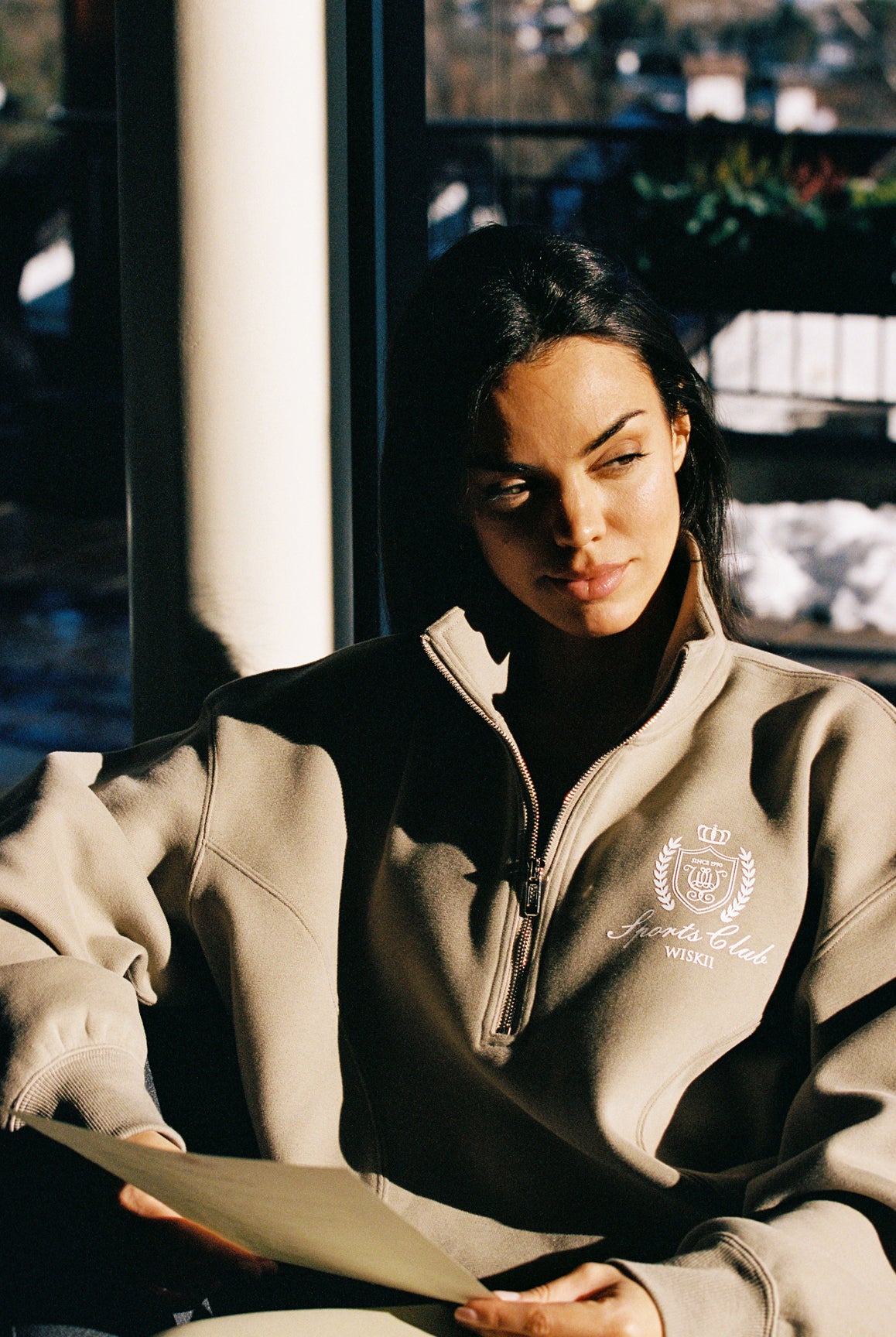 Retro WISKII half-zip polo sweatshirt in warm fabric, featuring a relaxed fit and stylish loungewear design.