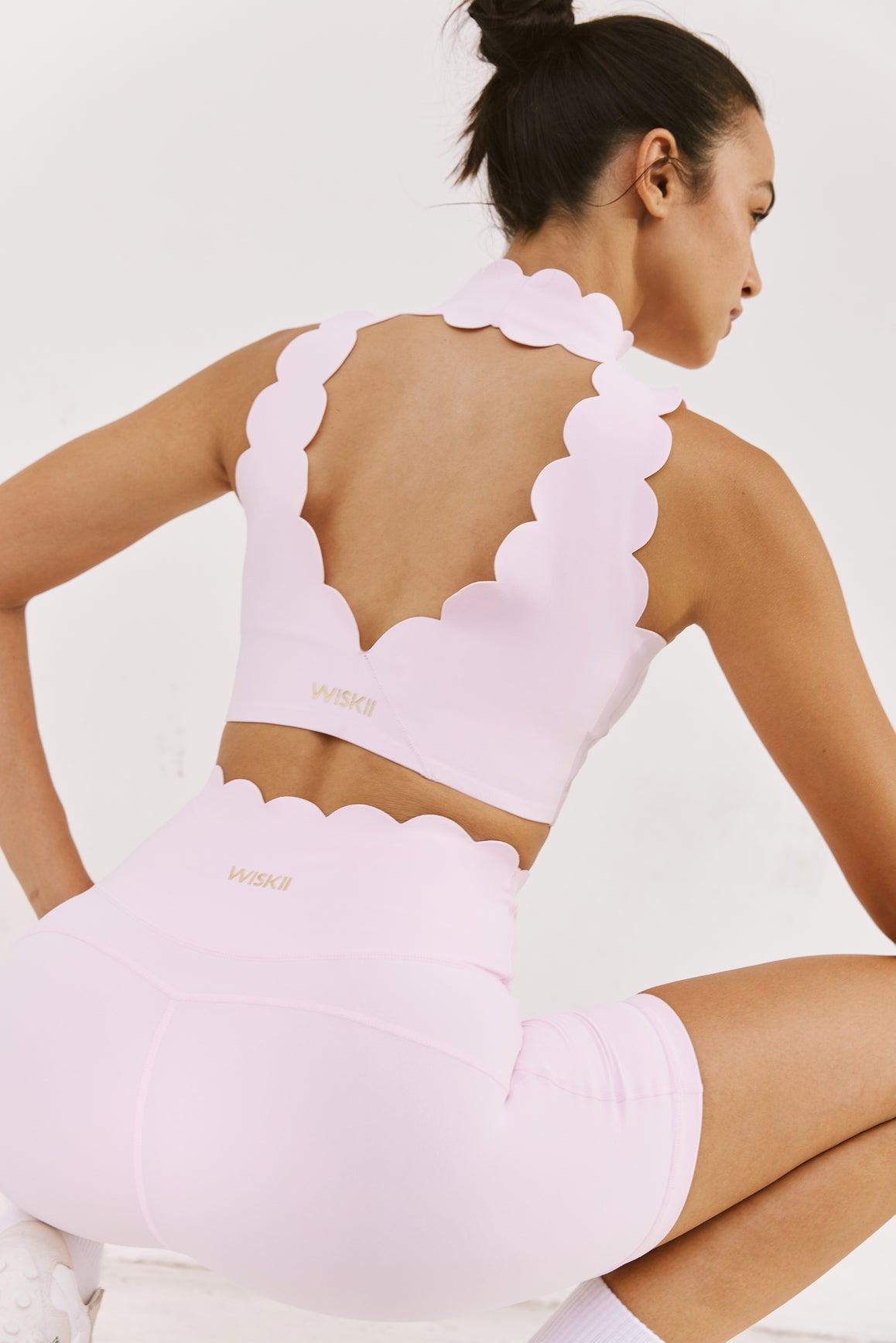 WISKII high-waist sculpting biker shorts in ballet blush color, designed for comfortable, figure-enhancing active wear.