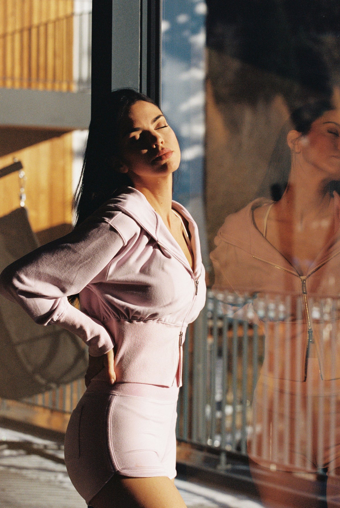 Cream WISKII Leisure Mini Shorts laid flat, showing their casual fit and lightweight fabric perfect for summer wear.