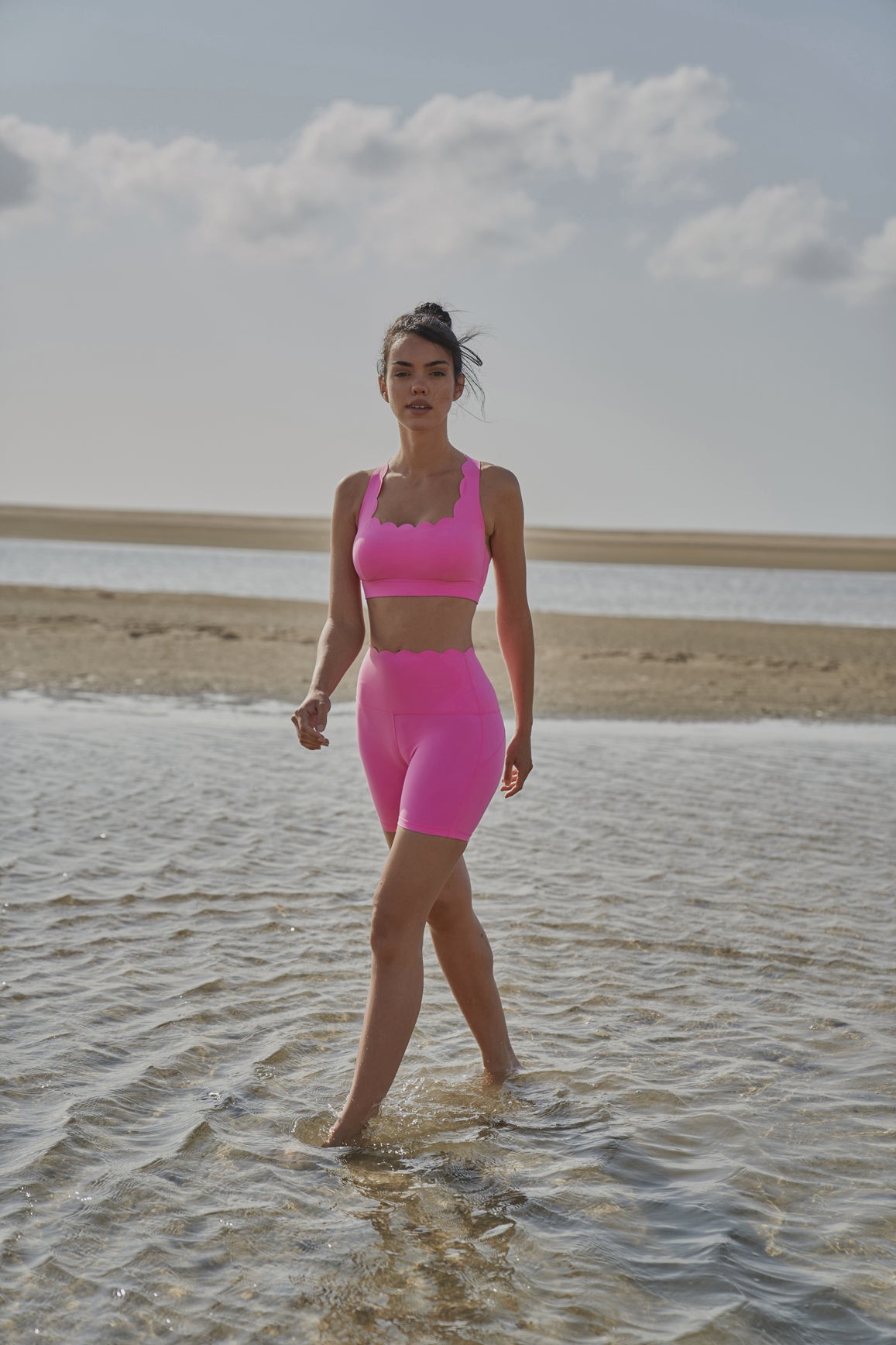 Ivory high-waist sculpting biker shorts by WISKII, showcasing a snug fit and smooth fabric for active wear and shaping.