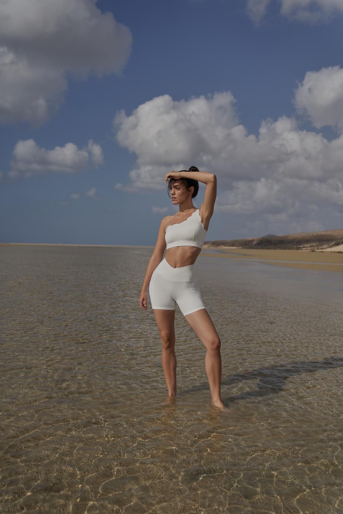 Pink WISKII V-Waist Vigorous Shorts with stylish Hollywood-inspired design, shown on model with casual pose.