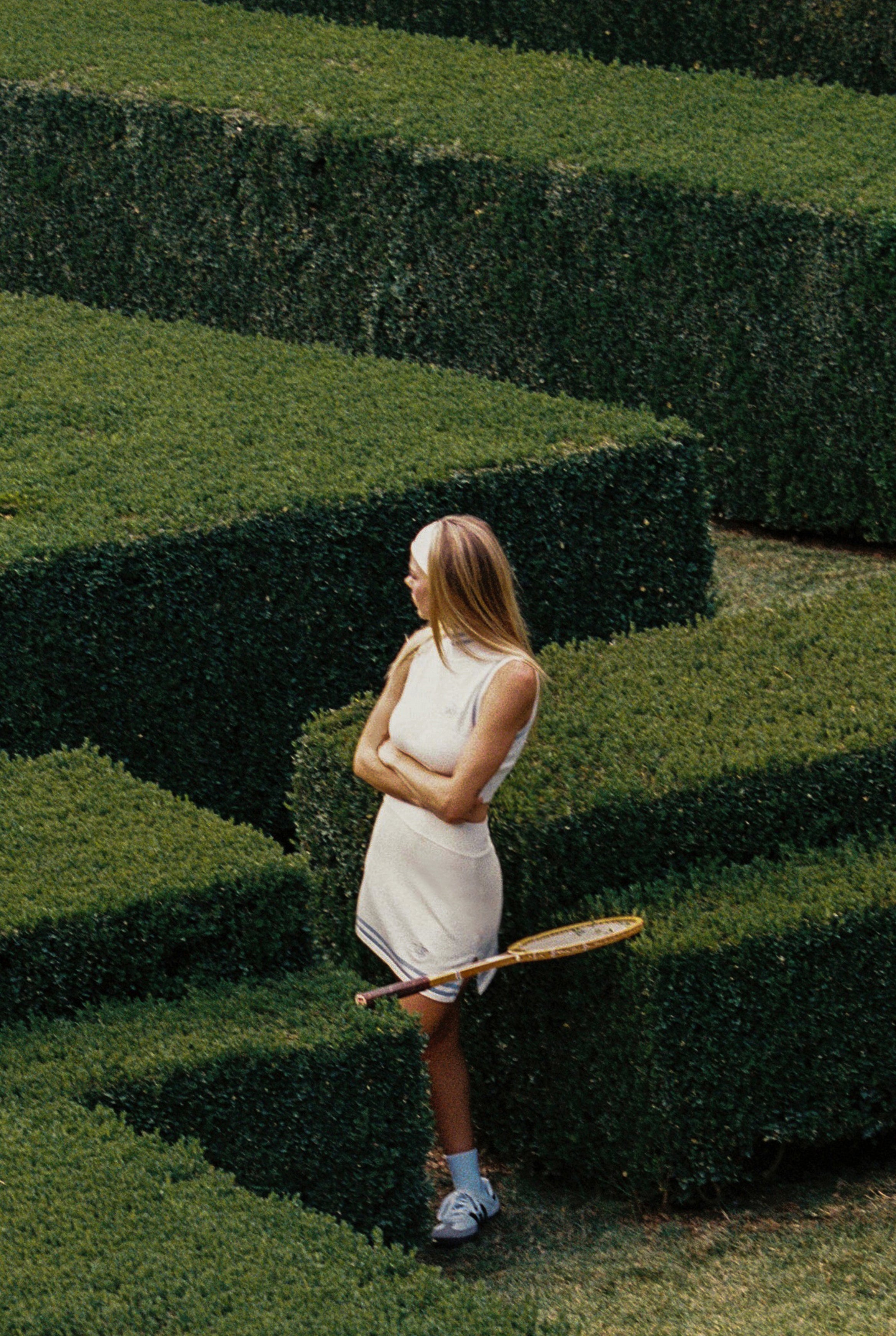 Model wears Mirto Knit Mini Skirt | Cream | WISKII Active