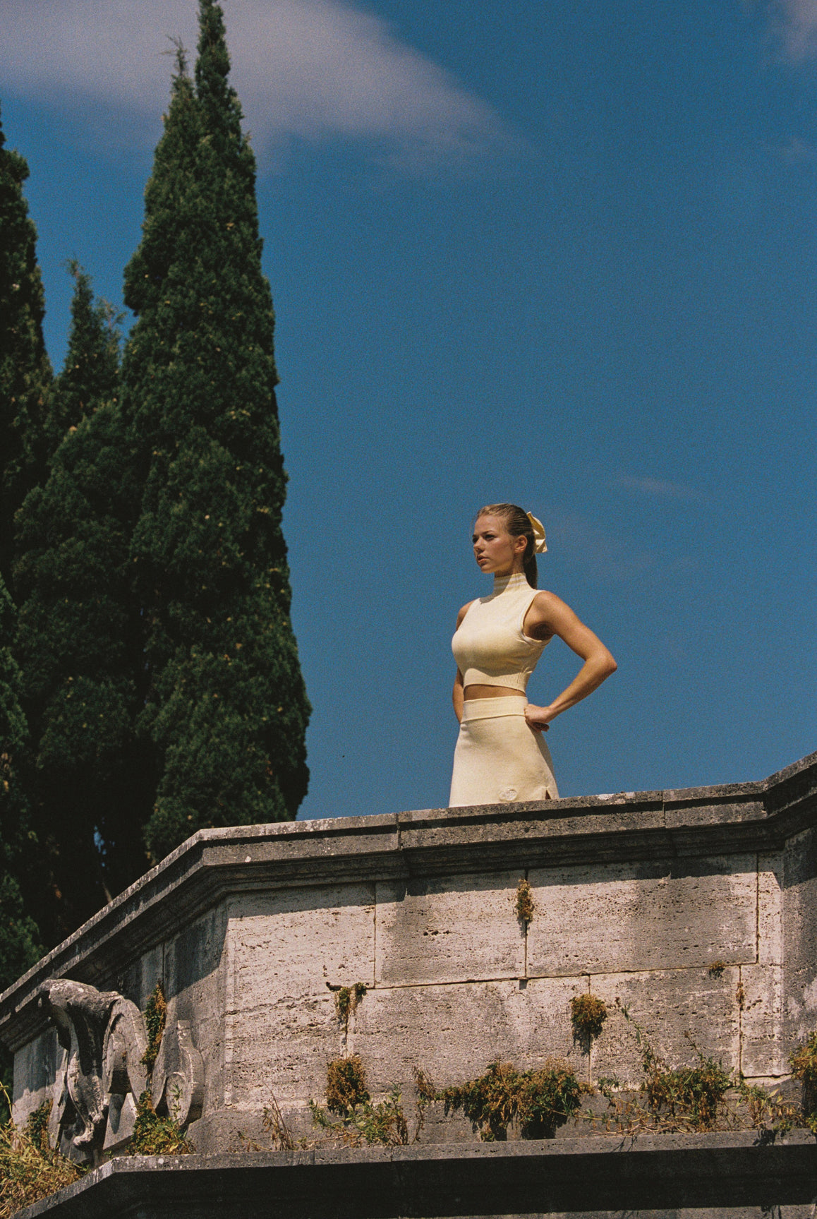 Model wears Mirto Knit Mini Skirt | Lemon Chiffon | WISKII Active