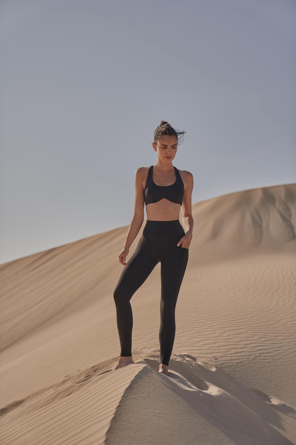 Ivory WISKII Dreamy Cutout Sports Yoga Bra with stylish cutouts and supportive design.