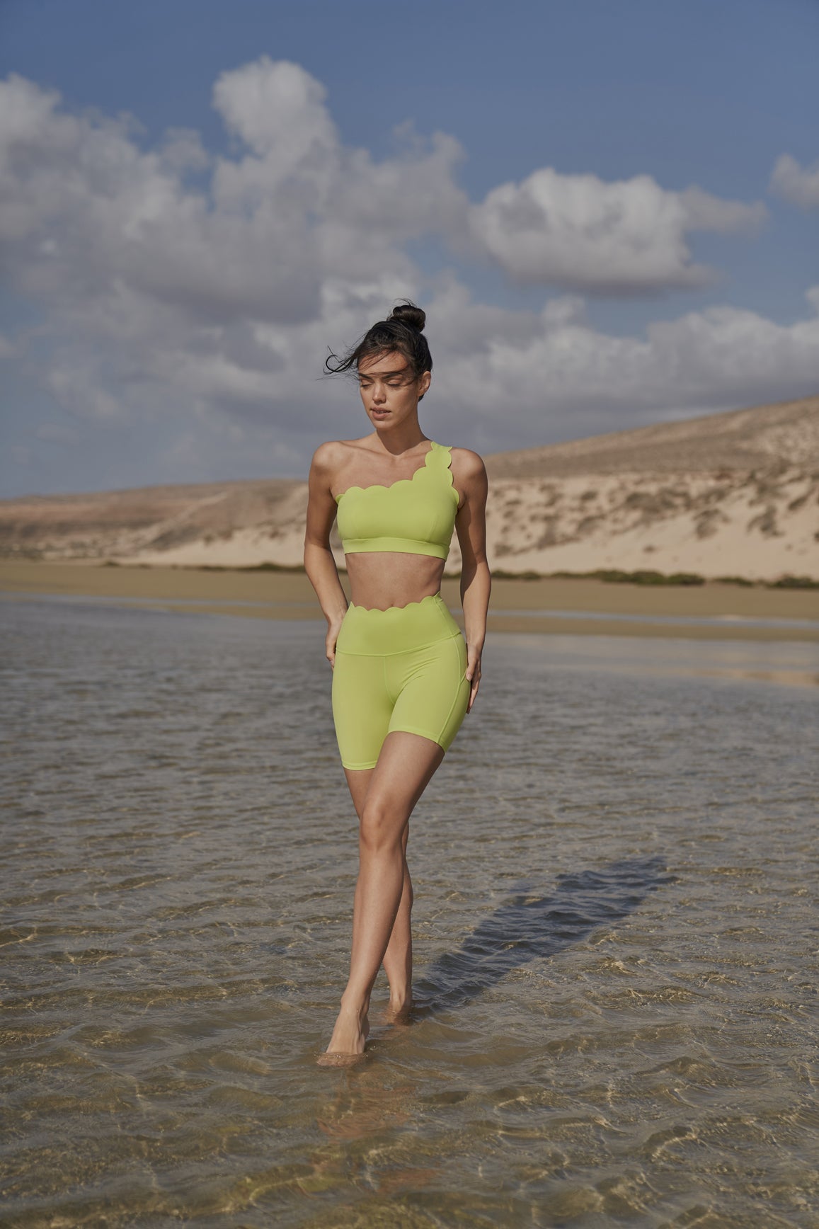 WISKII Dynamic One Shoulder Sports Bra in mulled wine color, featuring a stylish one-shoulder design and supportive fit.