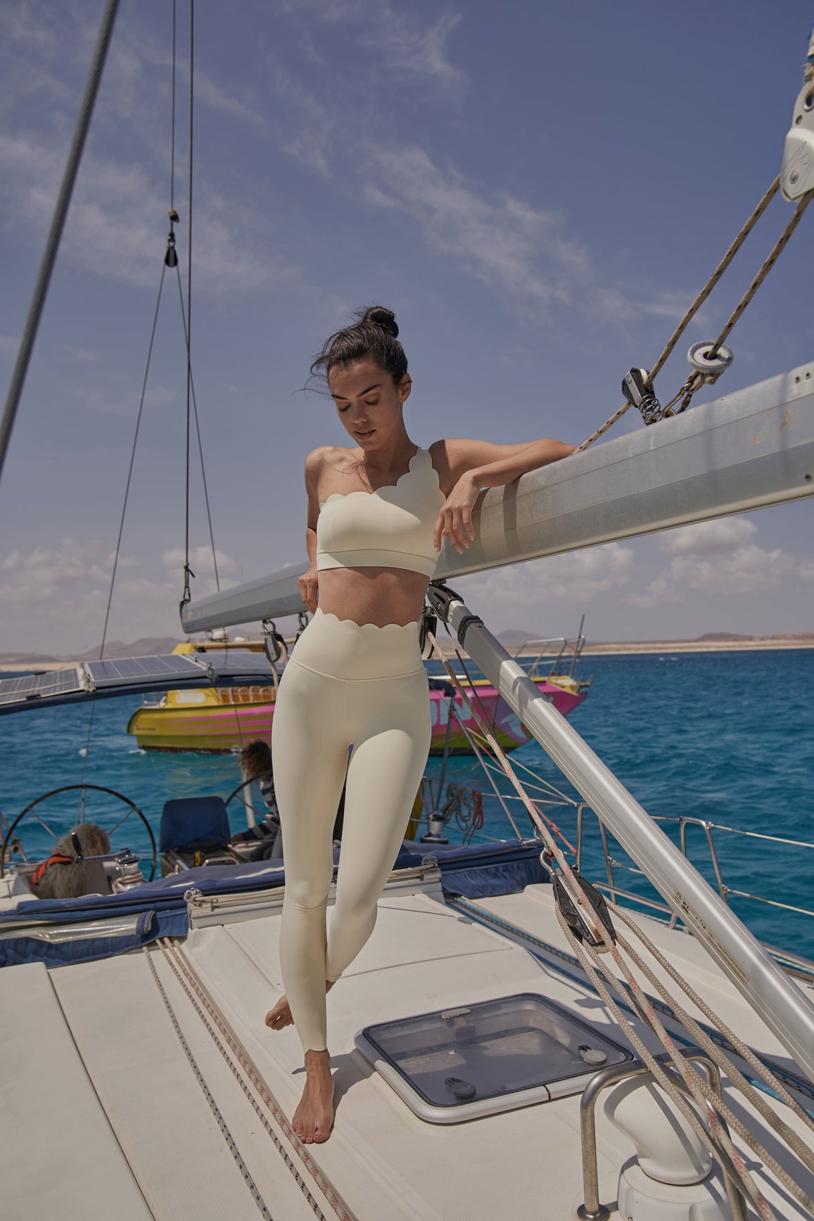 WISKII dynamic one shoulder sports bra in mulled wine color, featuring a stylish asymmetric design and supportive fit.