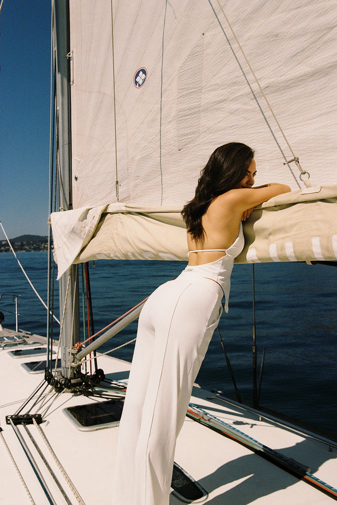 Model wears a Riviera Floral Halter Vest | Ivory Vest | WISKII Active