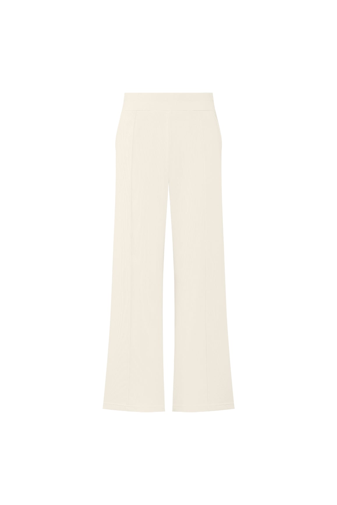 WISKII Riviera wide leg pants in beige, flowy fabric, high waist with belt loops, styled with a white blouse.