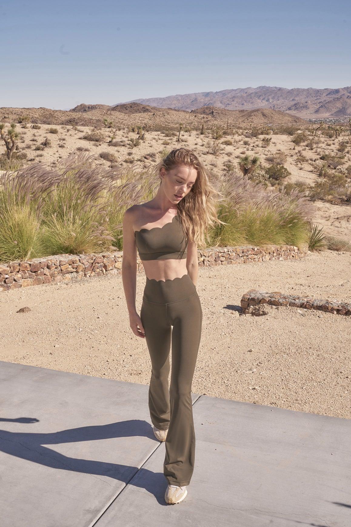 WISKII Dynamic One Shoulder Sports Bra in mulled wine color, featuring a stylish one-shoulder design and supportive fit.