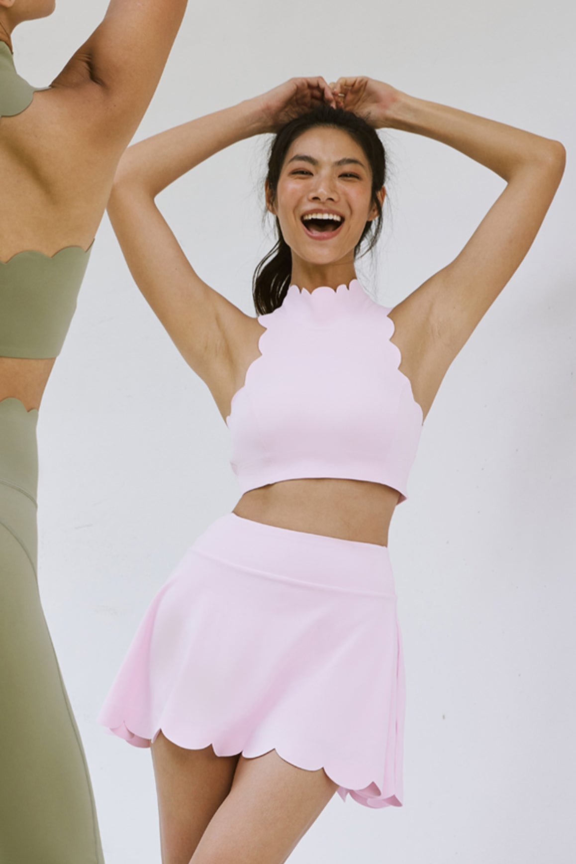 Model wears High-Waist A-line Tennis Skirt | WISKII ACTIVE