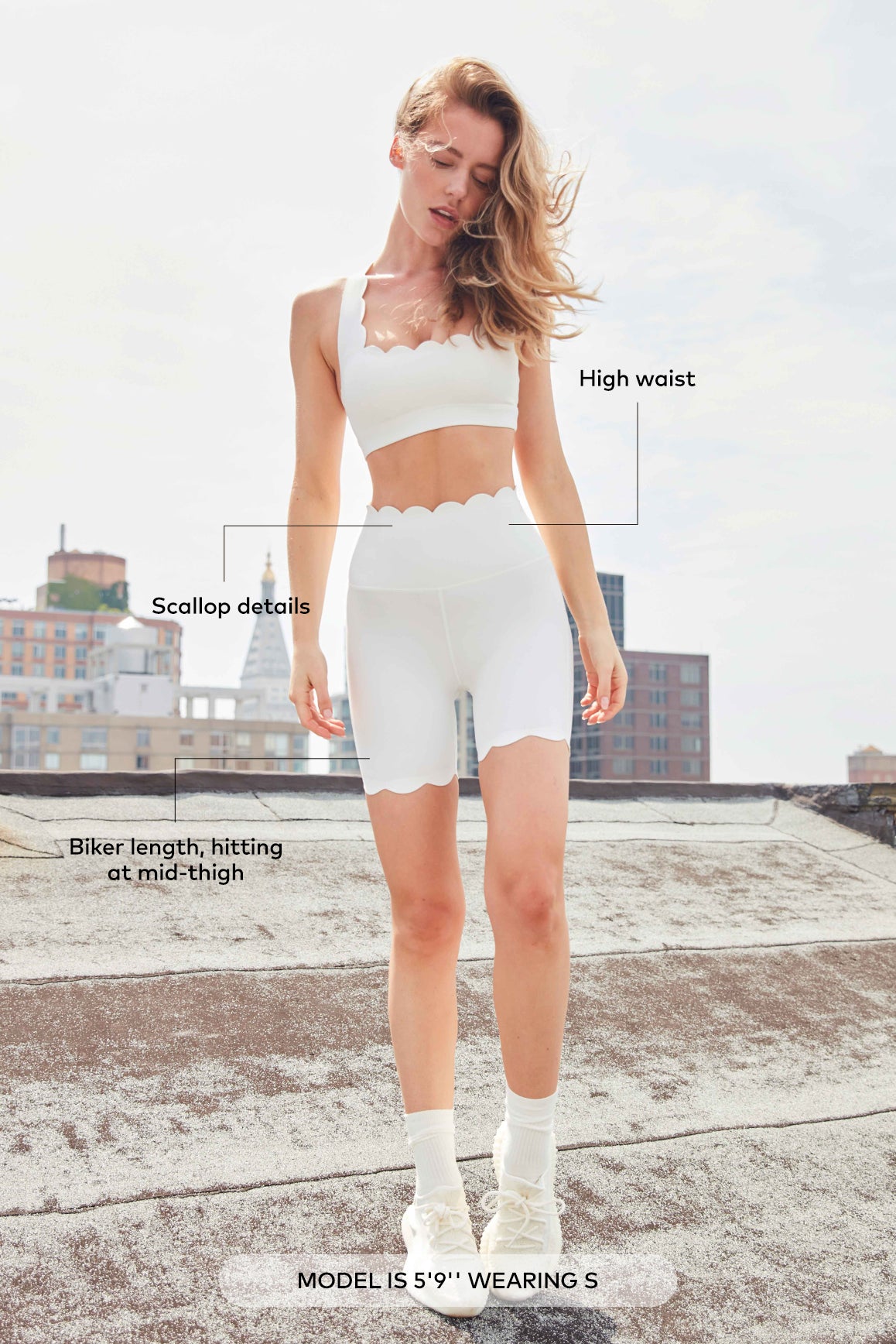 WISKII high-waist biker shorts in black, stretch fabric, close-up view showing fitted style and seamless waistband.