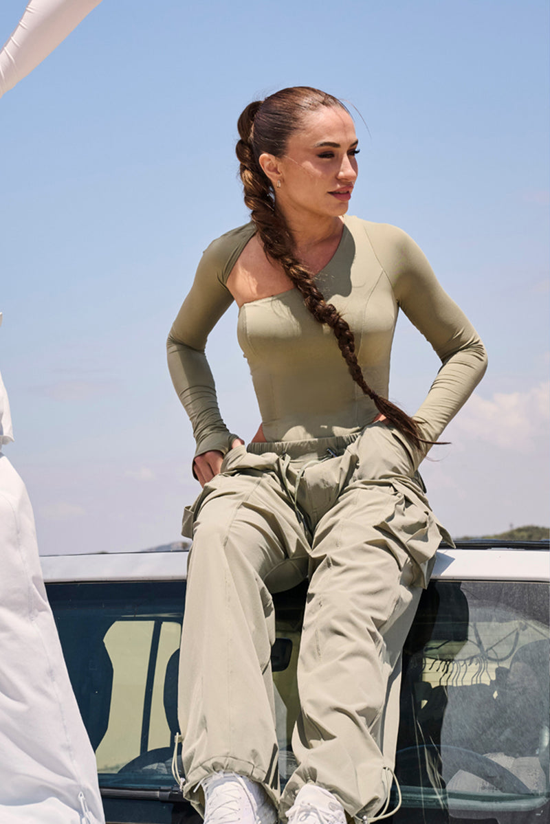 Model wears WISKII Modern Cargo Pant | WISKII Active | Muted Khaki