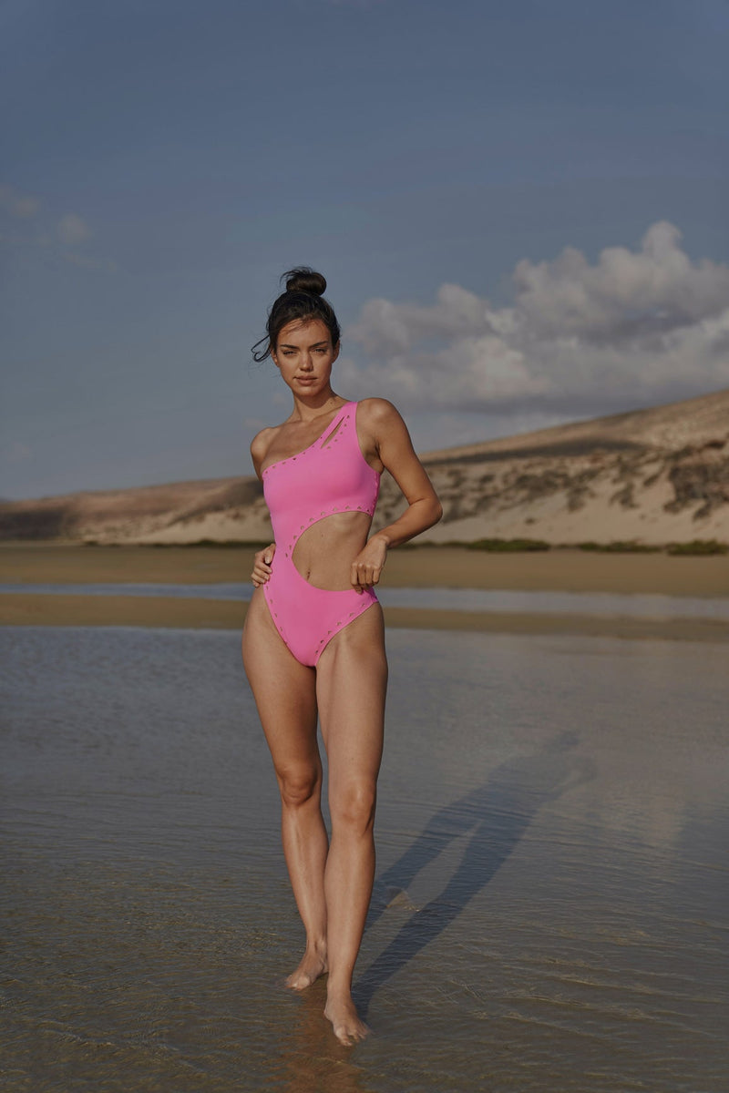Model wears WISKII One Shoulder Laser Cut Swimsuit
