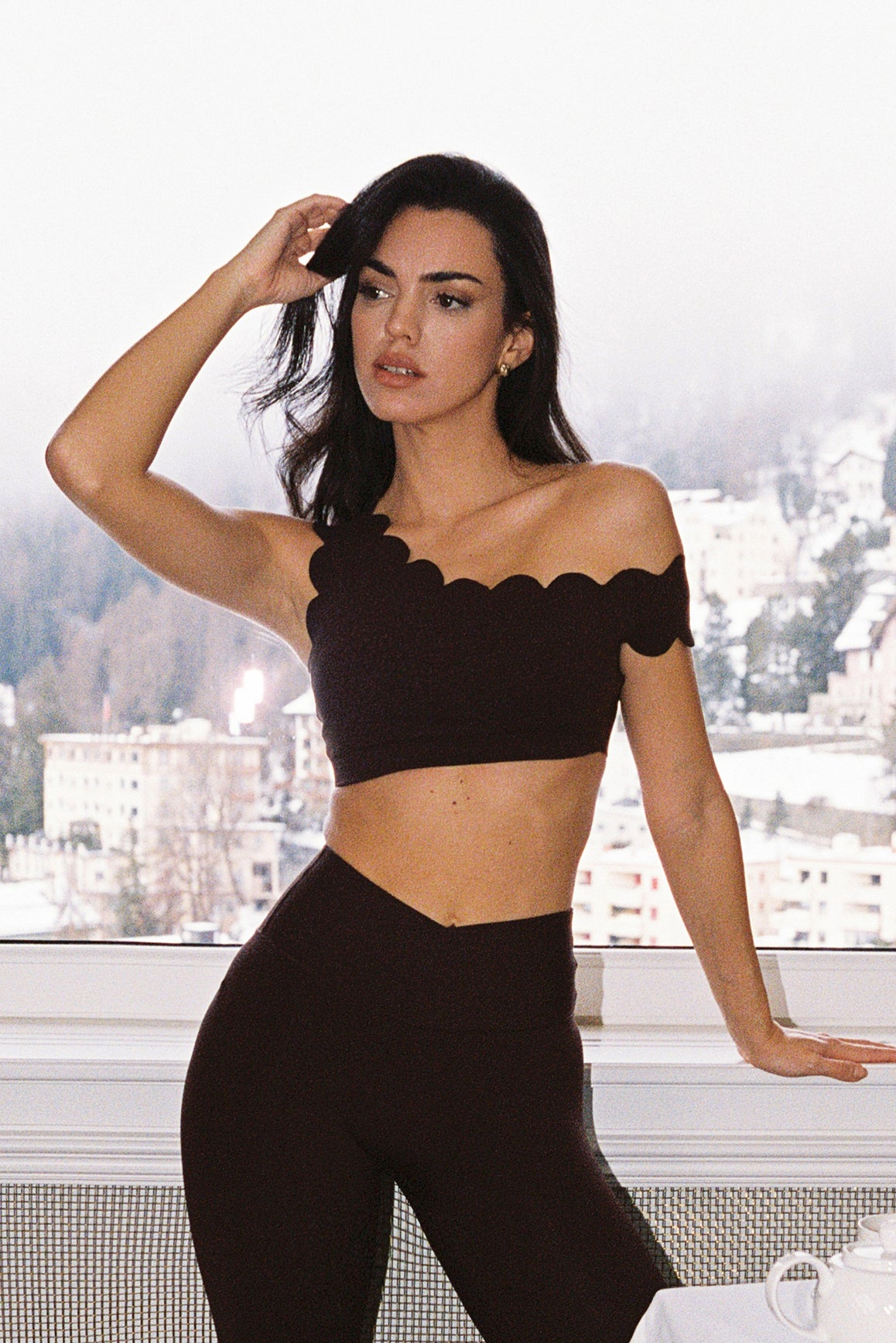 WISKII asymmetric off-shoulder scalloped sports bra with stylish design and comfortable fit, perfect for activewear.
