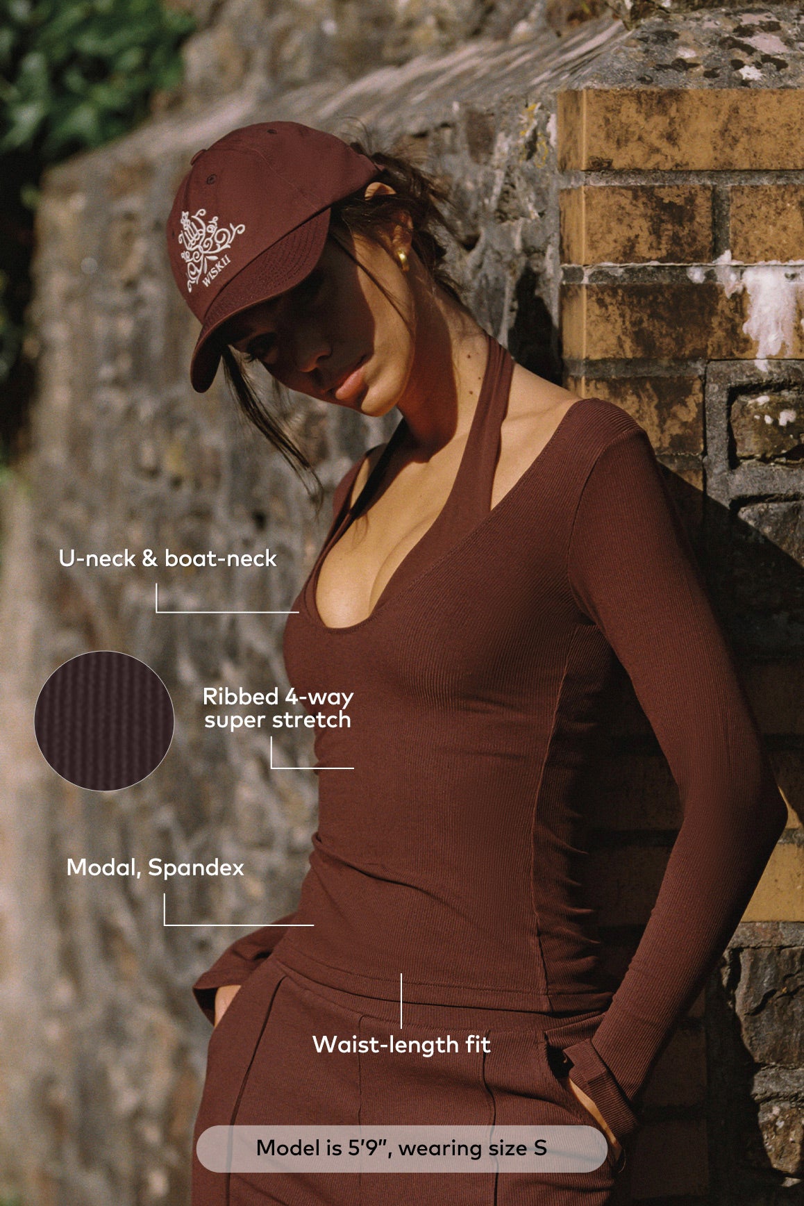 WISKII Duo long sleeve top, stylish and comfortable women's long sleeve shirt made from soft fabric, navy color, close-up view.