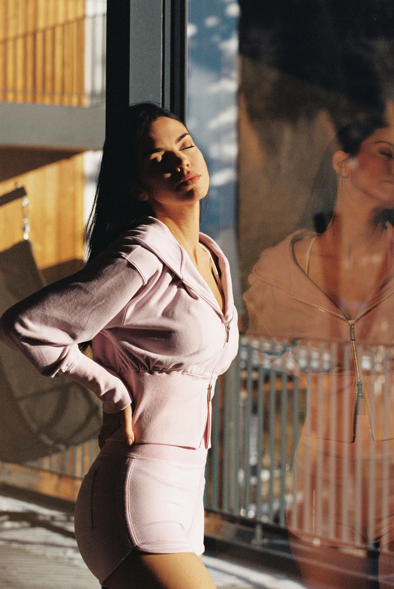  Model wears Leisure Mini Short WISKII Active