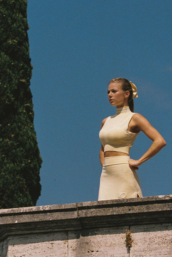 Model wears Mirto Knit Mock Neck Tank | Lemon | WISKII Active