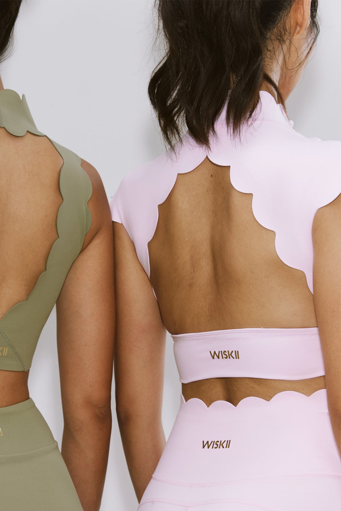 Model wears Scallop Cutout Mock Neck Bra | WISKII ACTIVE