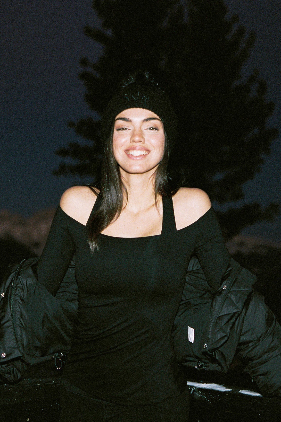 Model wears a Long Sleeve Ruched Off-Shoulder Top | WISKII ACTIVE | Black