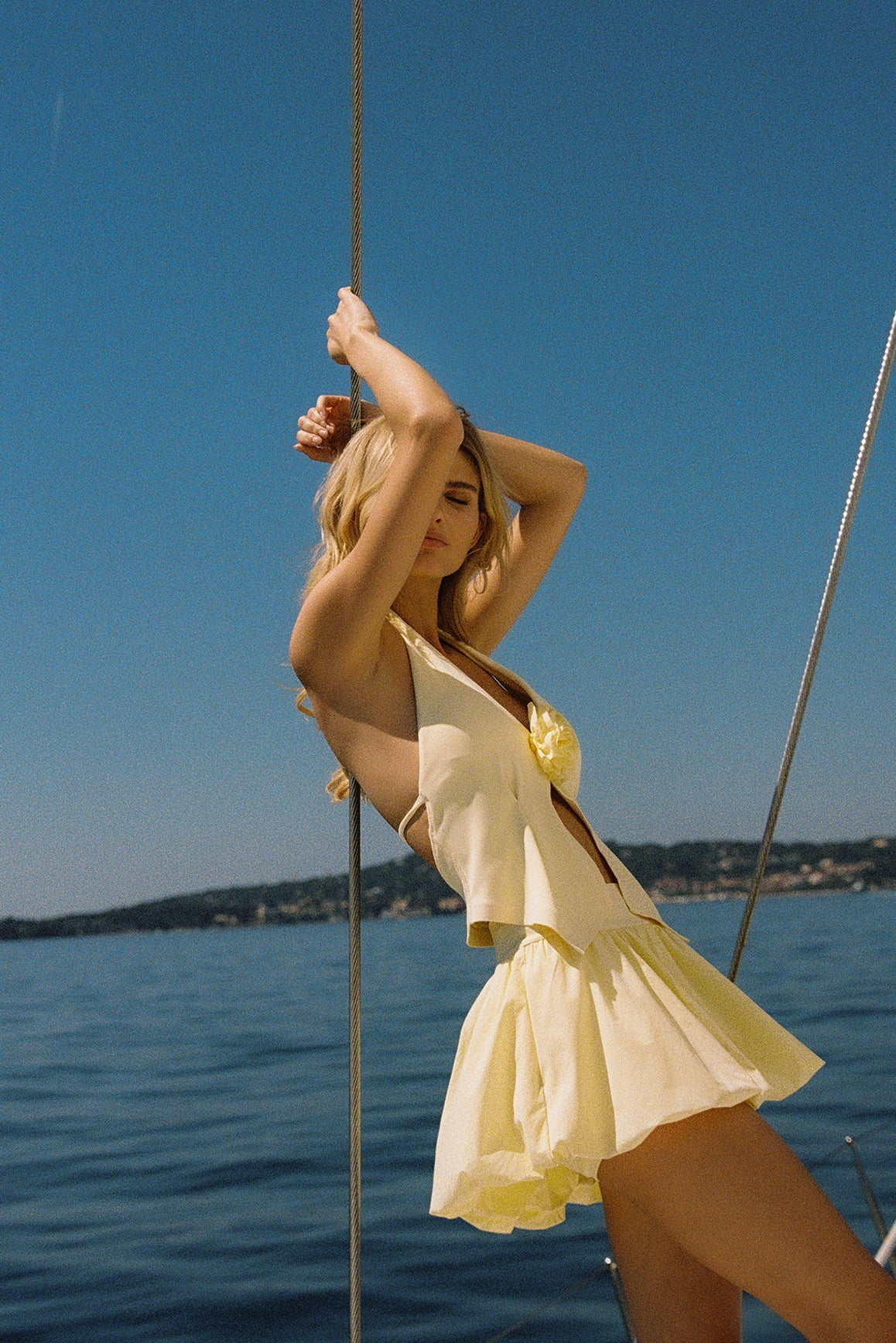 Model wears a Mini Bubble Skirt | Lemon Drop | WISKII Active