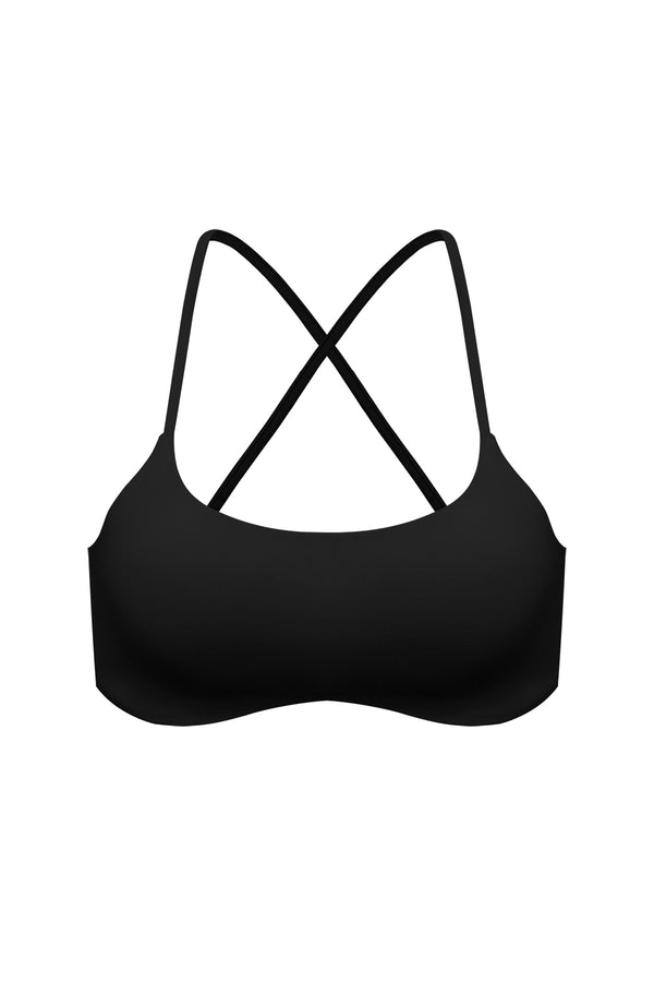 Model wears a Minimal Crossback Bra | WISKII ACTIVE | Color black