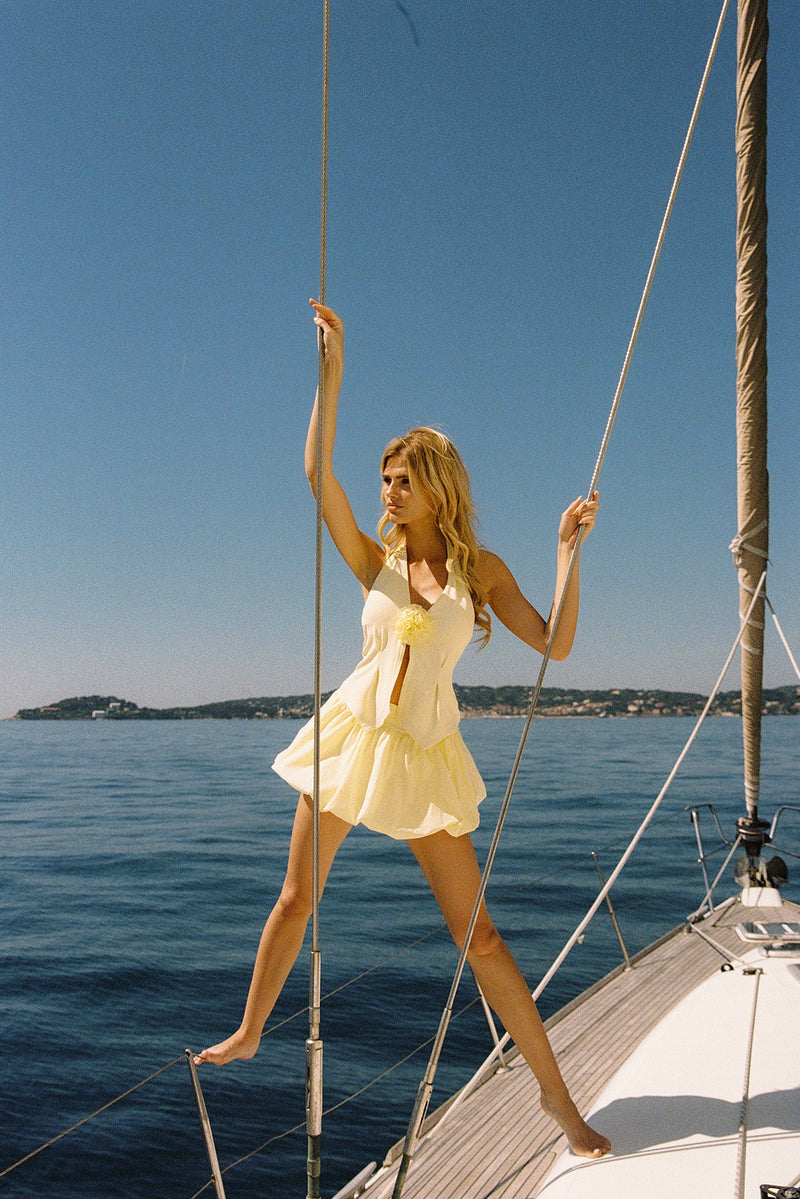 Model wears a Riviera Floral Halter Vest | WISKII Active