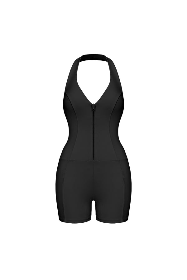 Model wears a Riviera Hourglass Zip Front Romper | Black| WSKII Active