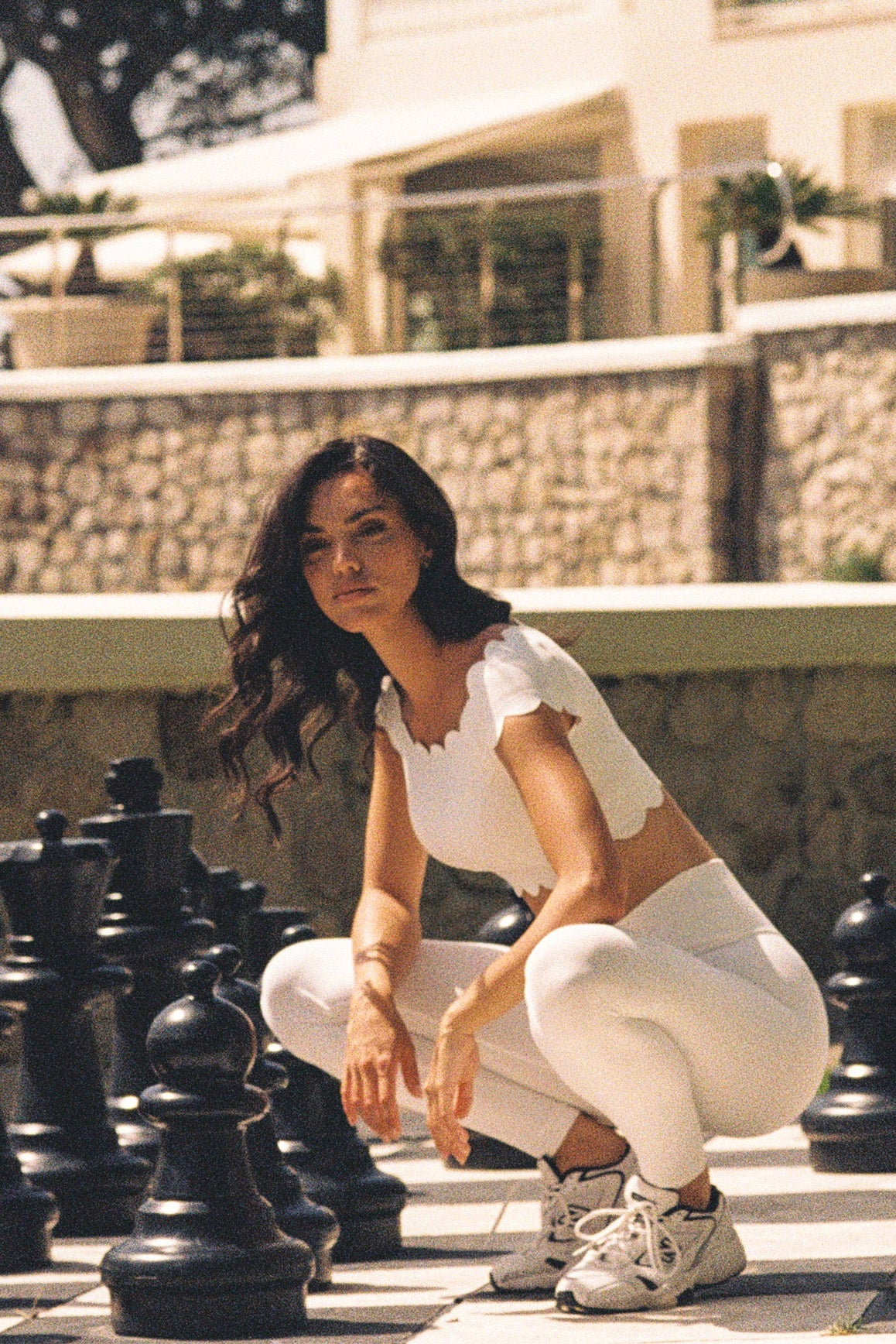 Model wears a Riviera V-waist Scrunch Legging | Ivory | WISKII Active